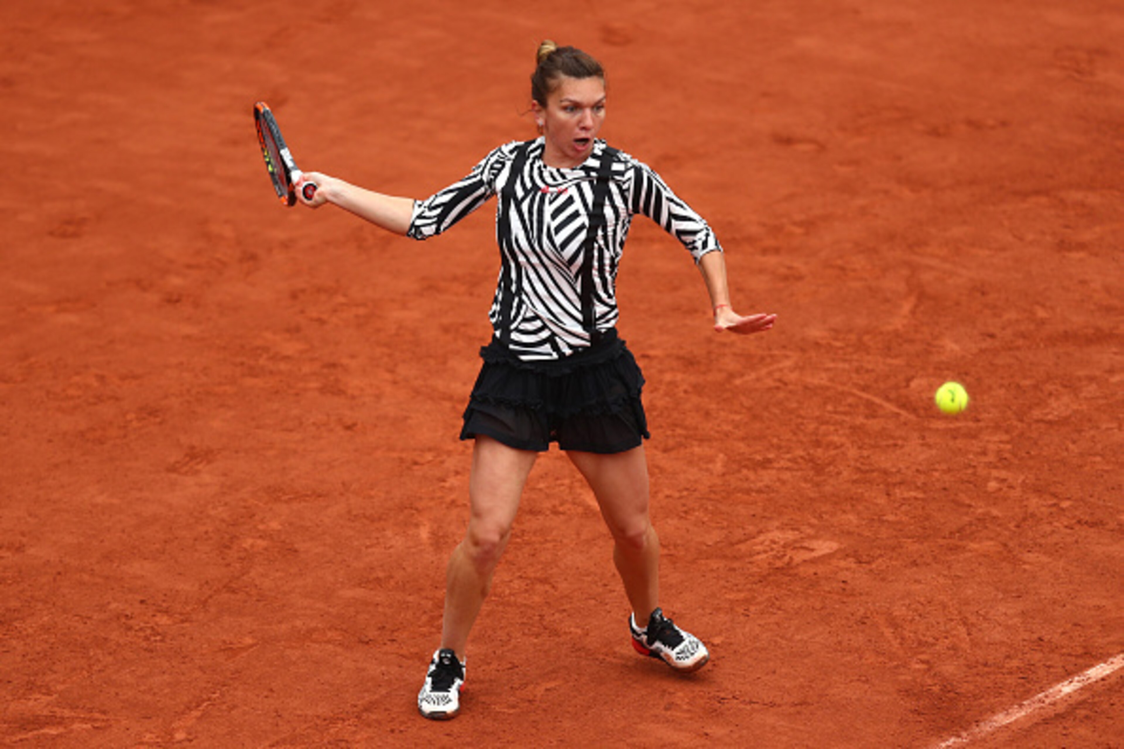 Simona Halep prepares to hit a forehand at the 2016 French Open. Simona Halep prepares to hit a forehand at the 2016 French Open.