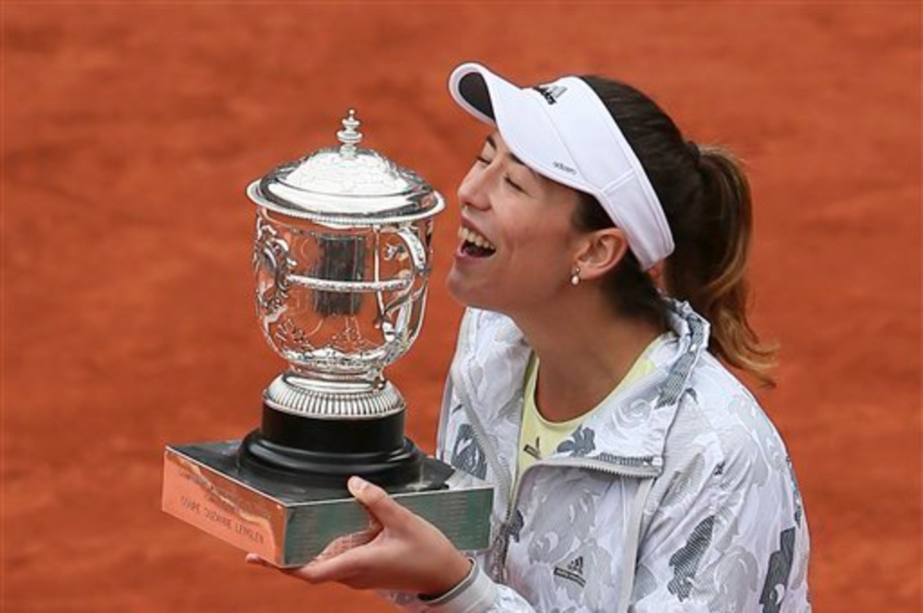 Garbine Muguruza celebrates winning her first Grand Slam title at the 2016 French Open.