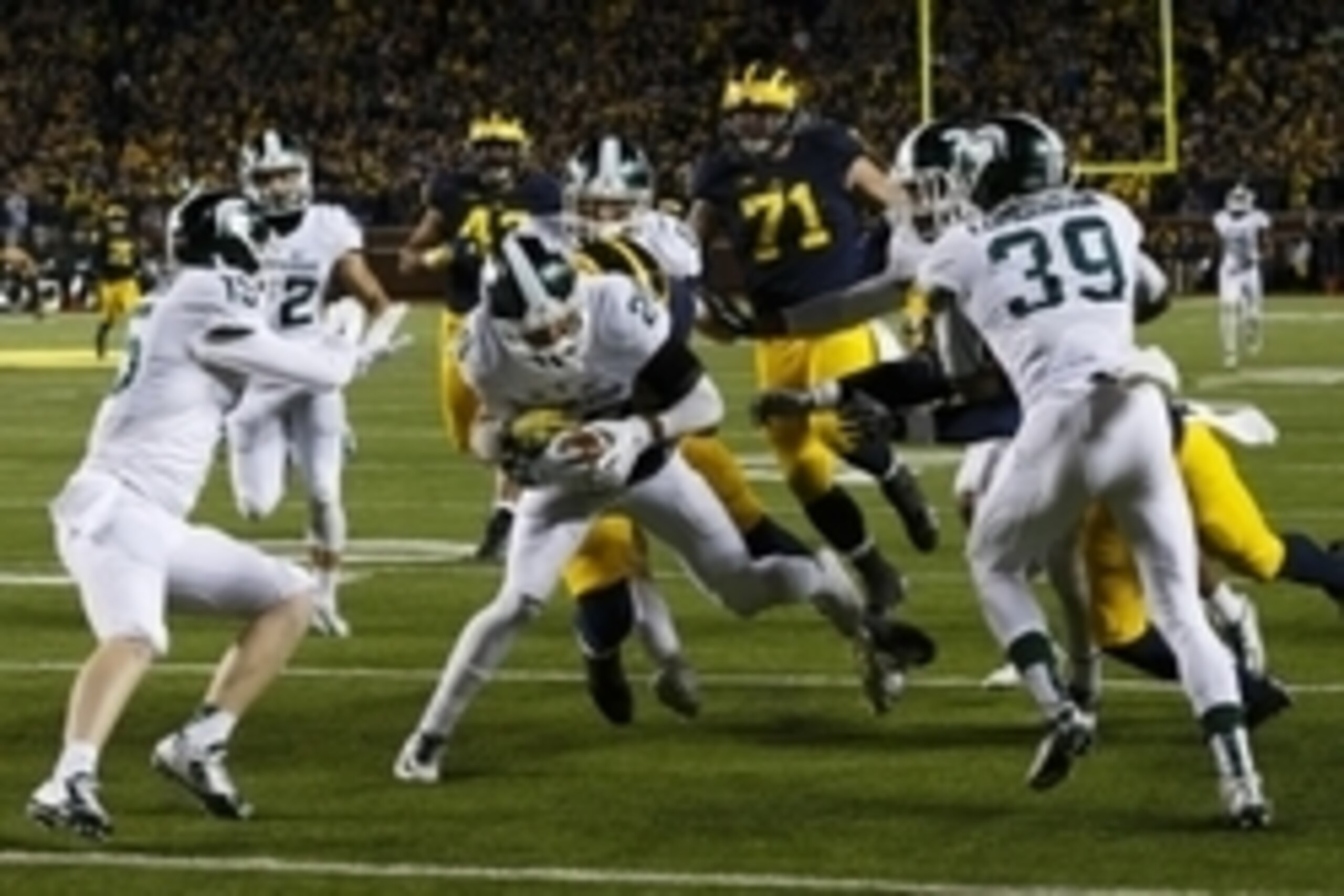 Michigan State DB Jalen Watts-Jackson (center)
