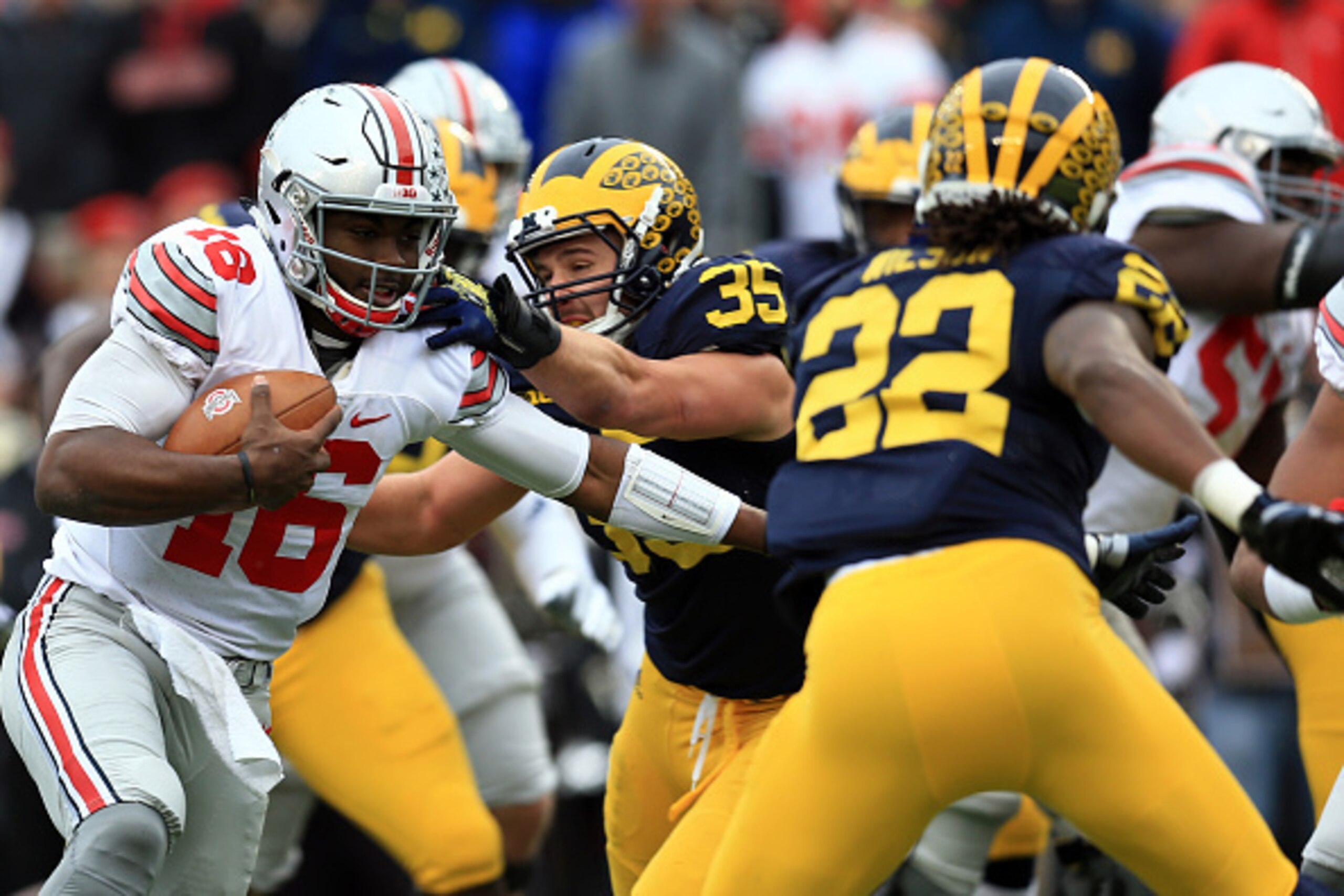 Ohio State QB J.T. Barrett (left)