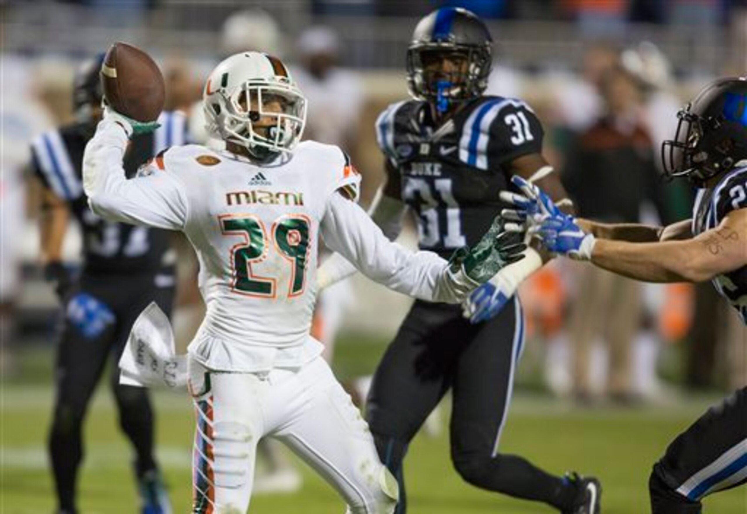 Miami DB Corn Elder (left)