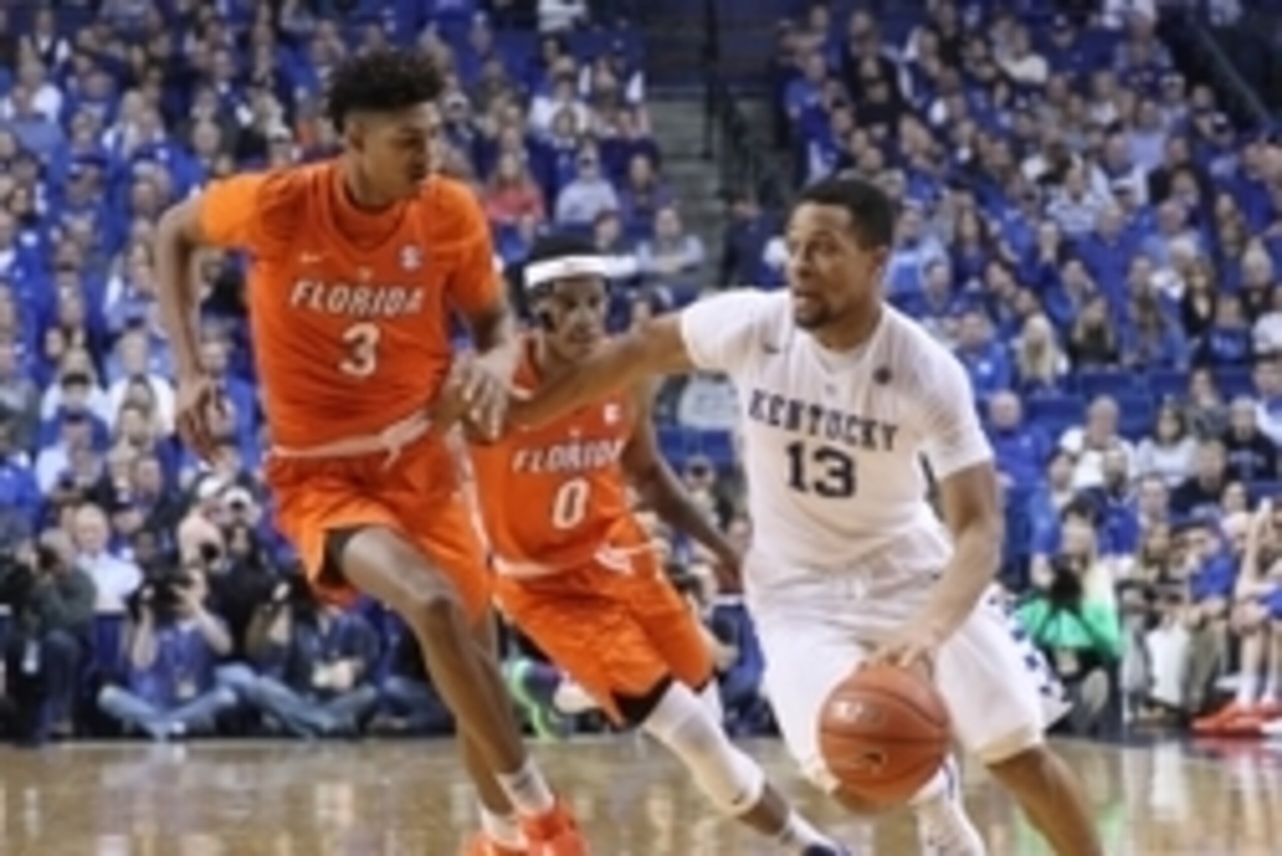 Devin Robinson (3) and Isaiah Briscoe (13)