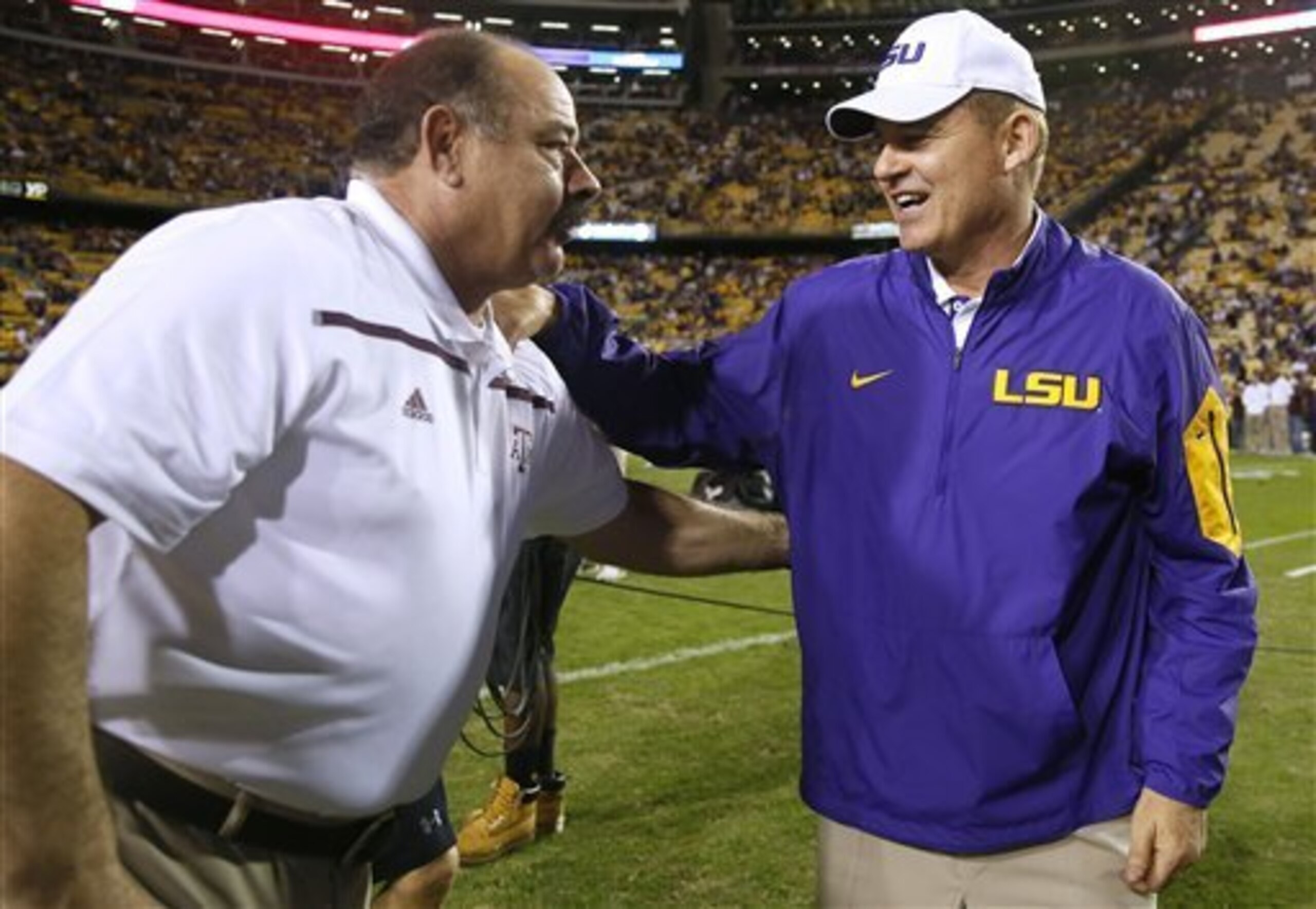 Texas A&M DC John Chavis (left)