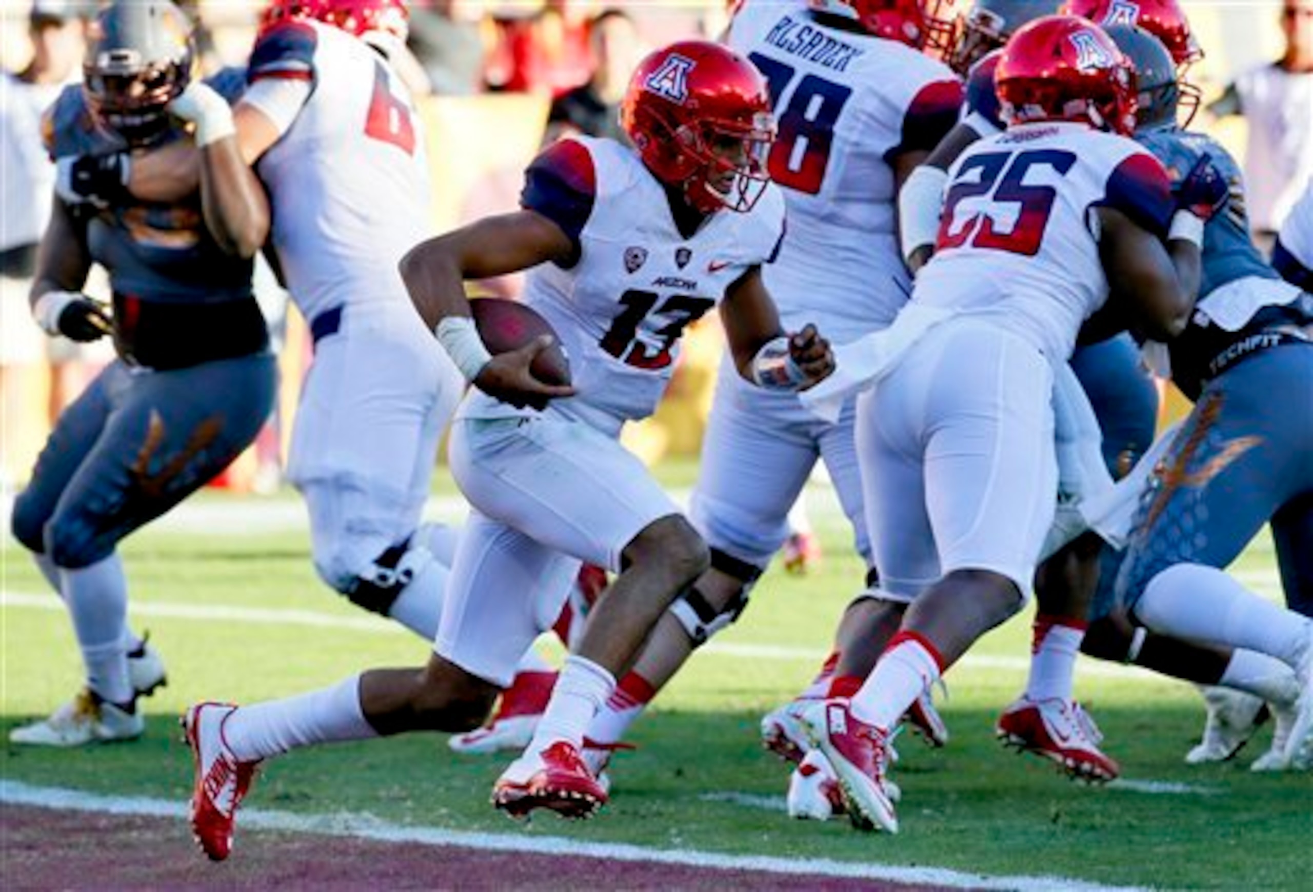 Brandon Dawkins is battling for Arizona's starting quarterback role.