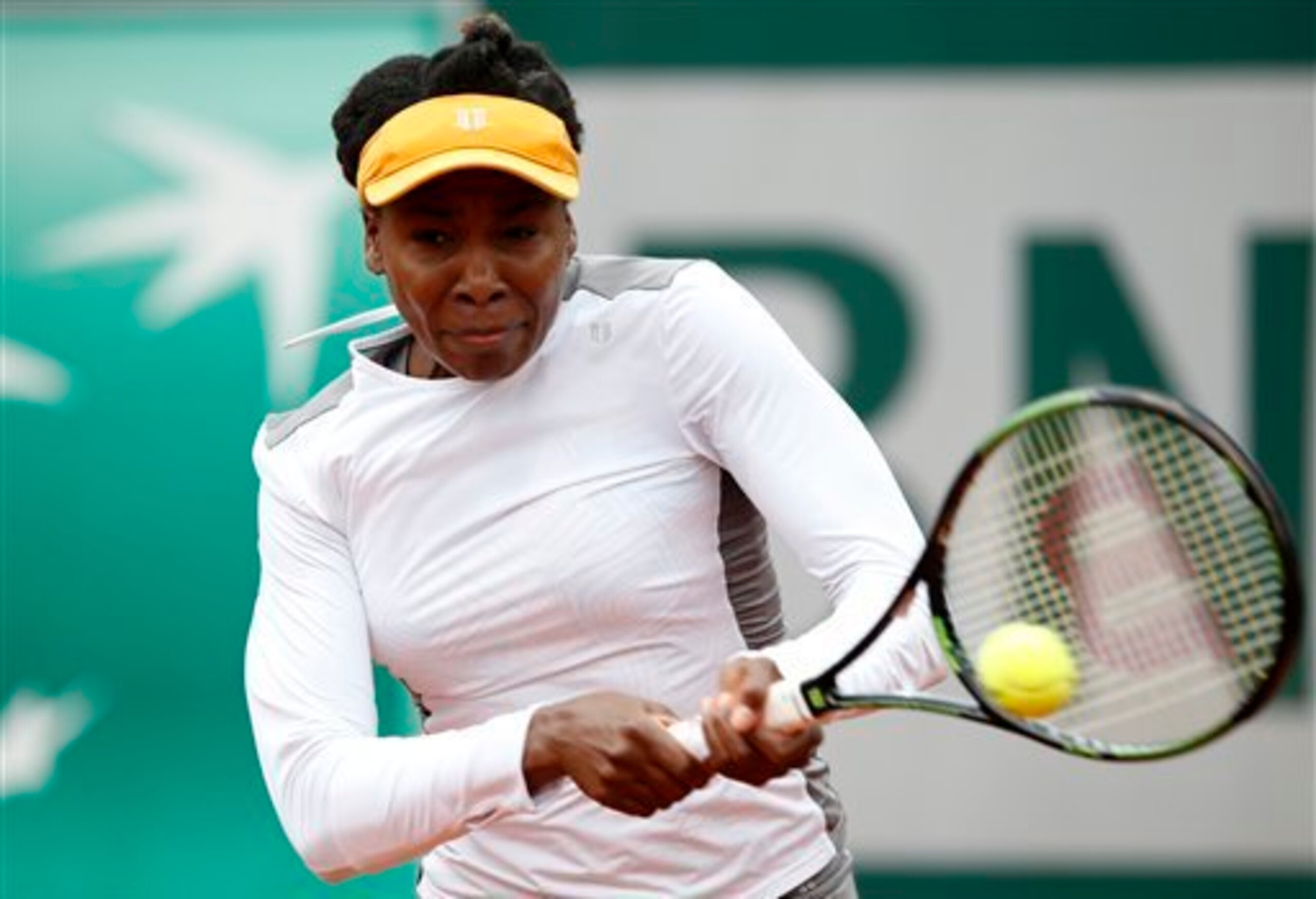 Venus Williams hits a backhand during a match at the 2016 French Open.