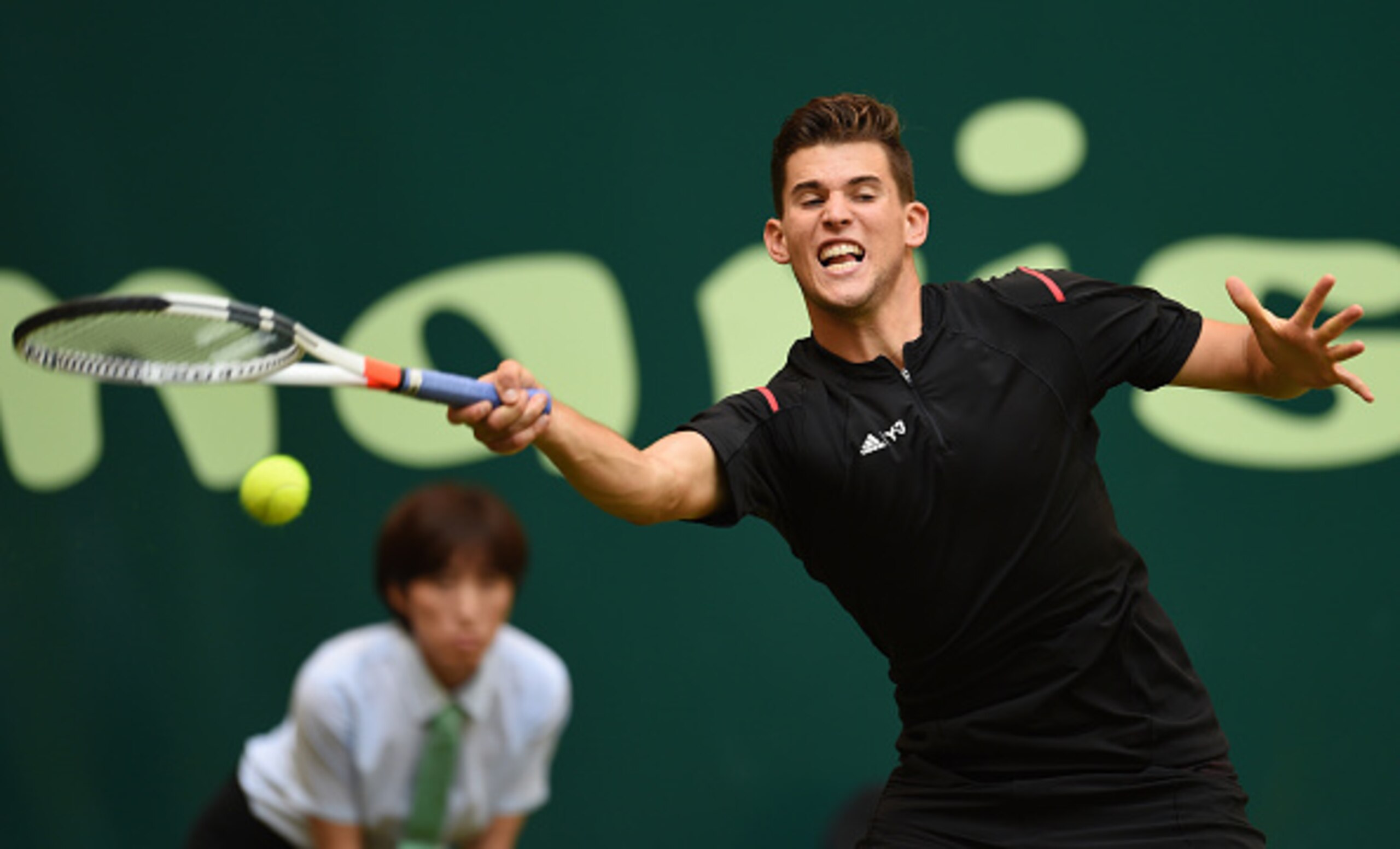 Dominic Thiem hits a forehand during a match at Halle.