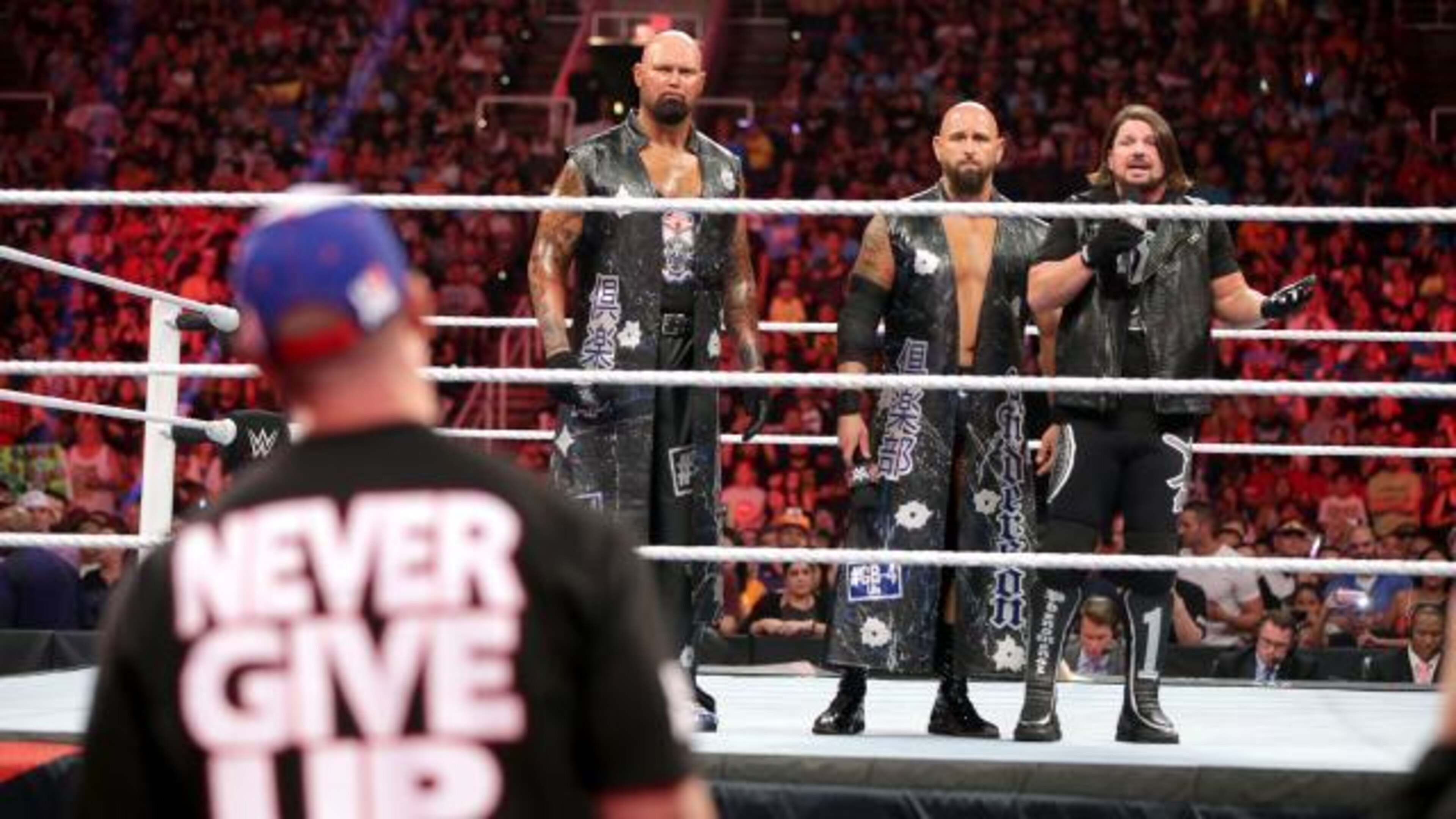John Cena stares down The Club. John Cena stares down The Club.