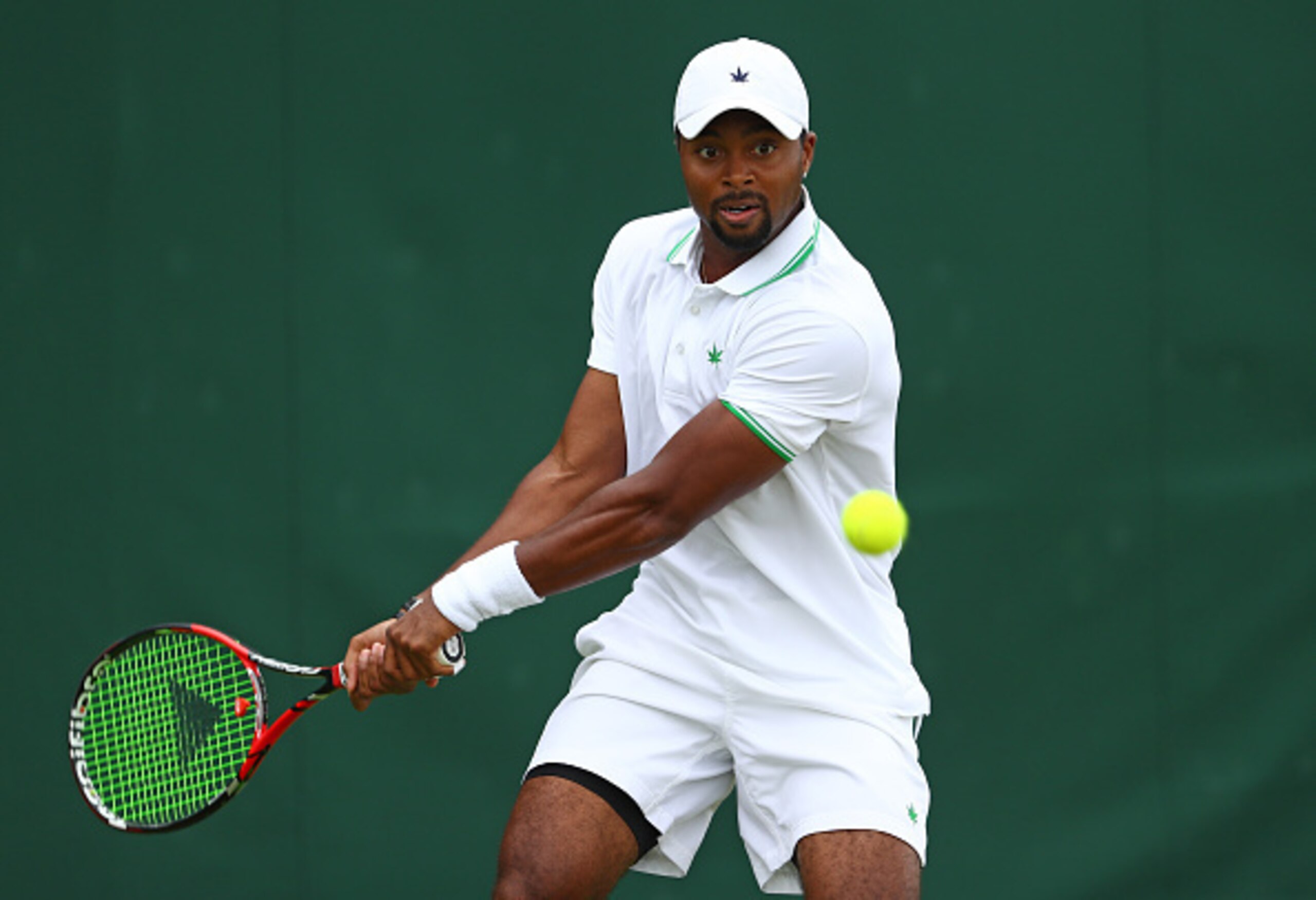 Donald Young hits a backhand during his first-round match at Wimbledon 2016. Donald Young hits a backhand during his first-round match at Wimbledon 2016.