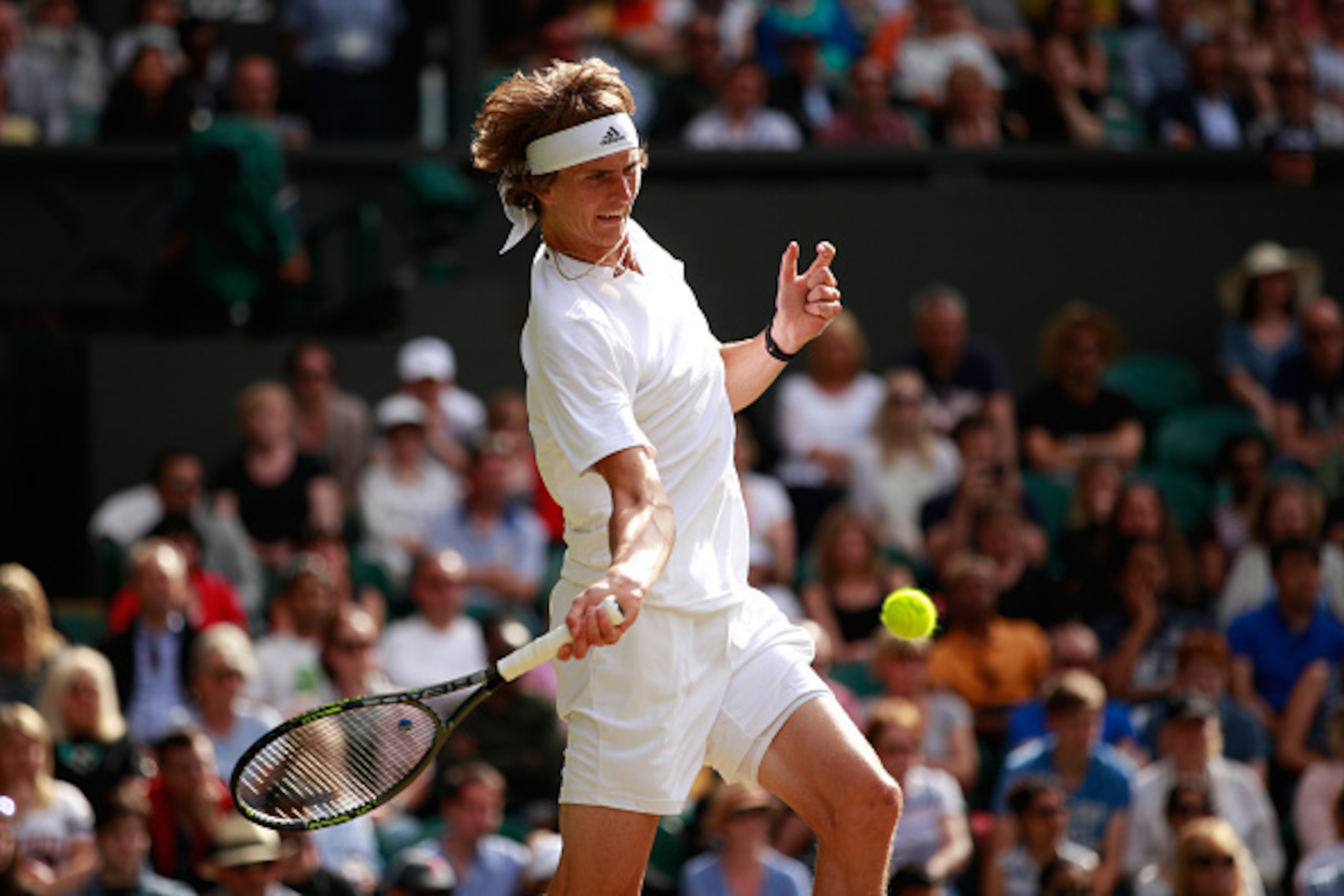 Alexander Zverev hits a forehand during a match at Wimbledon 2016. Alexander Zverev hits a forehand during a match at Wimbledon 2016.