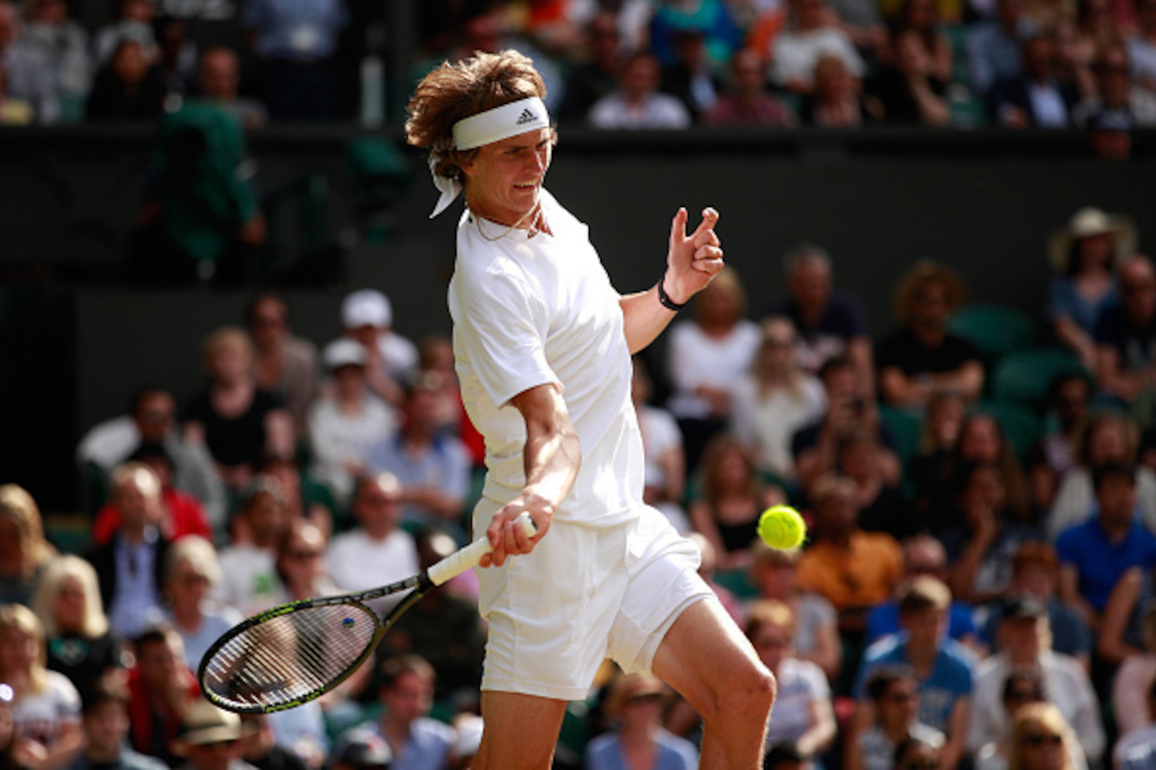 Alexander Zverev hits a forehand during a match at Wimbledon 2016.