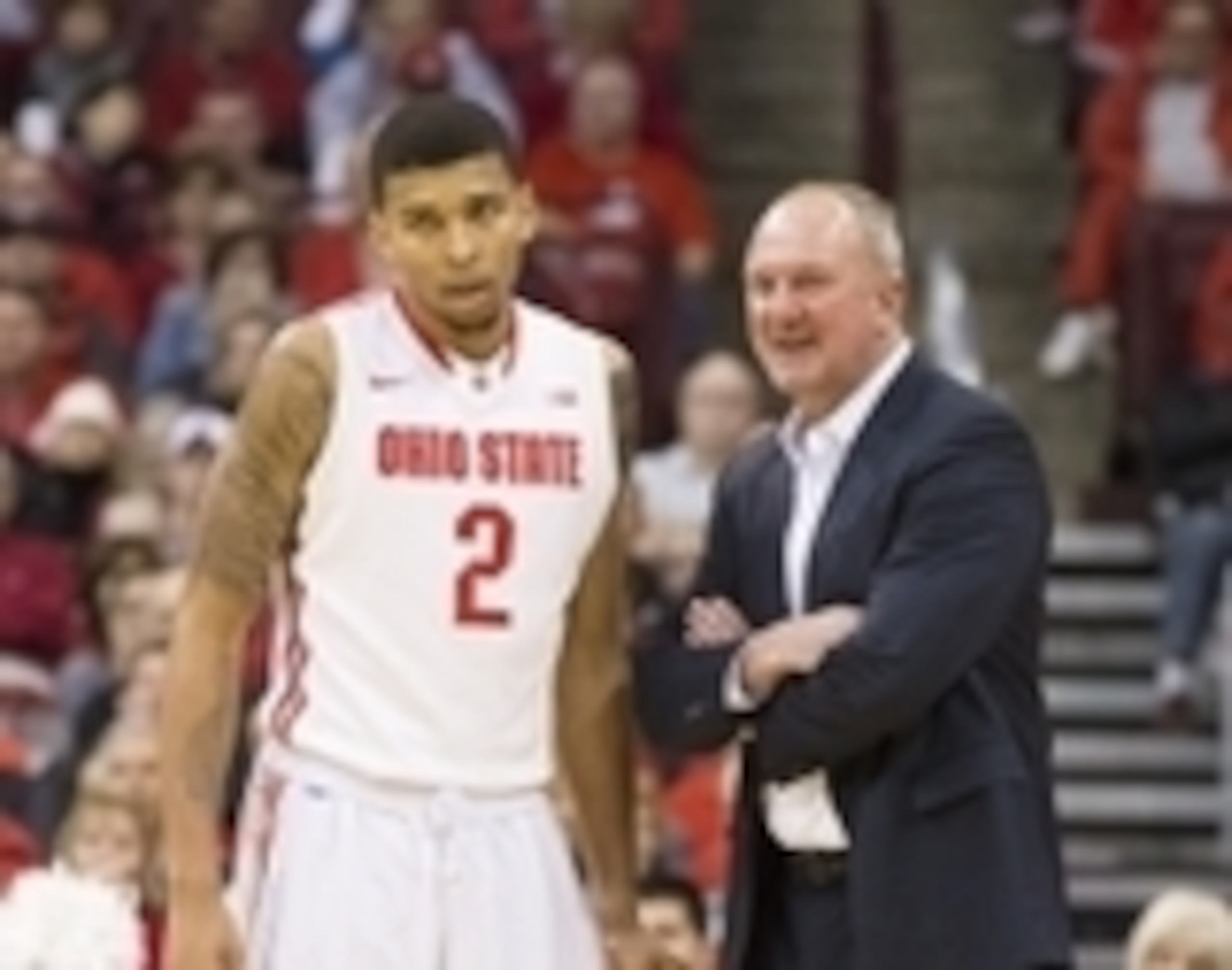Marc Loving (2) and Thad Matta