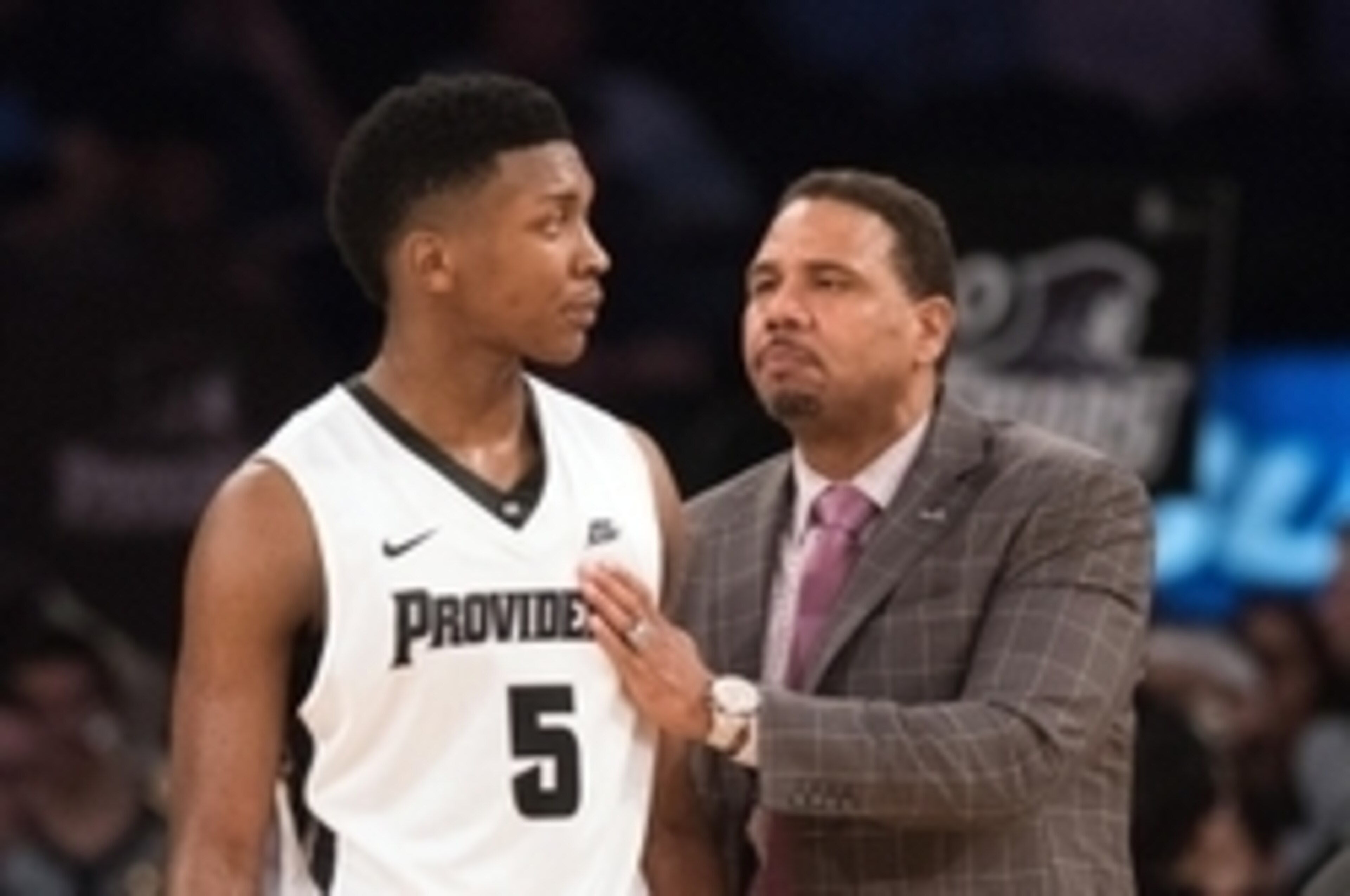 Rodney Bullock (5) and Ed Cooley