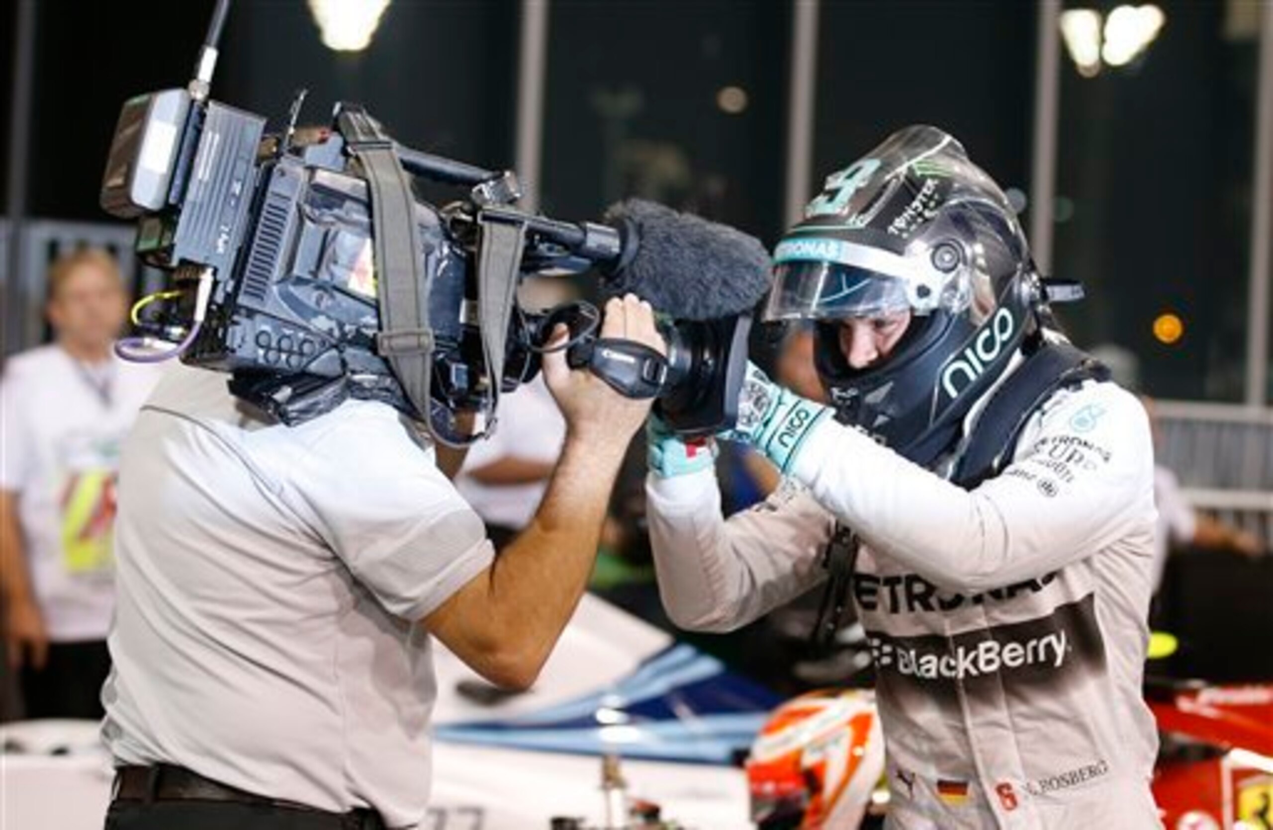 Nico Rosberg mugs for a television camera at the 2014 Abu Dhabi Grand Prix. Nico Rosberg mugs for a television camera at the 2014 Abu Dhabi Grand Prix.