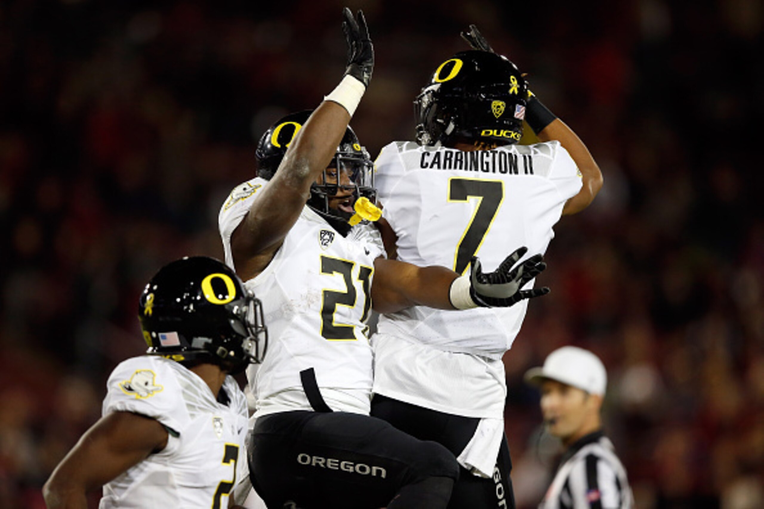 Oregon RB Royce Freeman (center) and WR Darren Carrington (right) Oregon RB Royce Freeman (center) and WR Darren Carrington (right)
