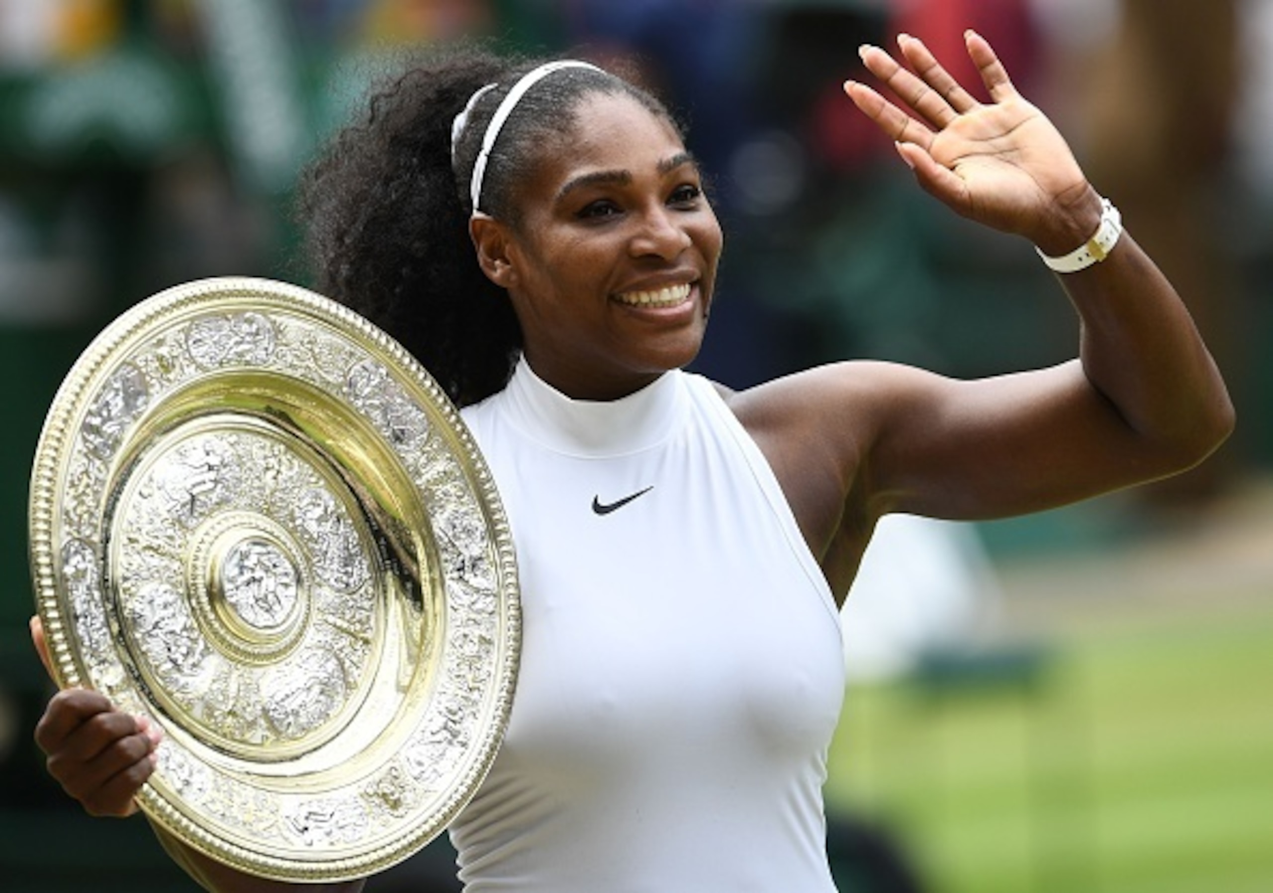 Williams celebrates after winning her seventh Wimbledon title.