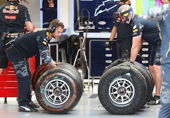 Red Bull mechanics prepare tyres at the Canadian Grand Prix.