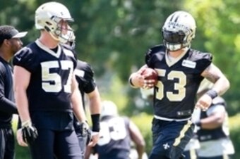 Saints LBs Dillon Lee (left) and James Laurinaitis