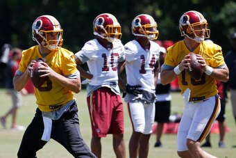 Washington QB Kirk Cousins (left)