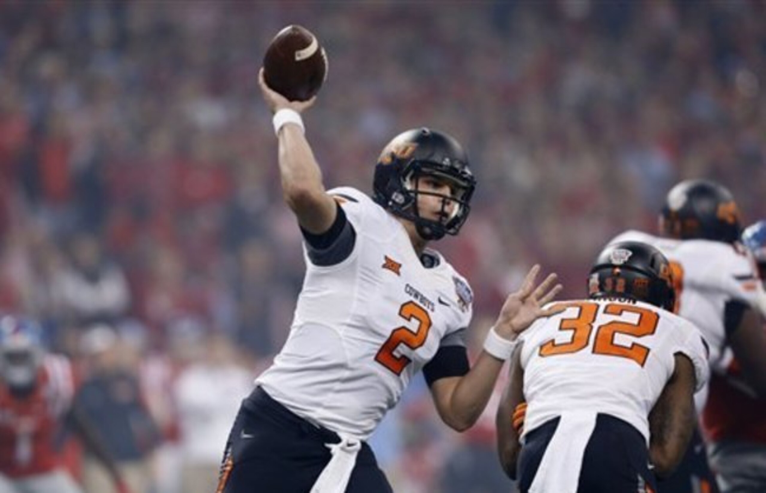 Mason Rudolph will lead a potent Oklahoma State offense this fall.