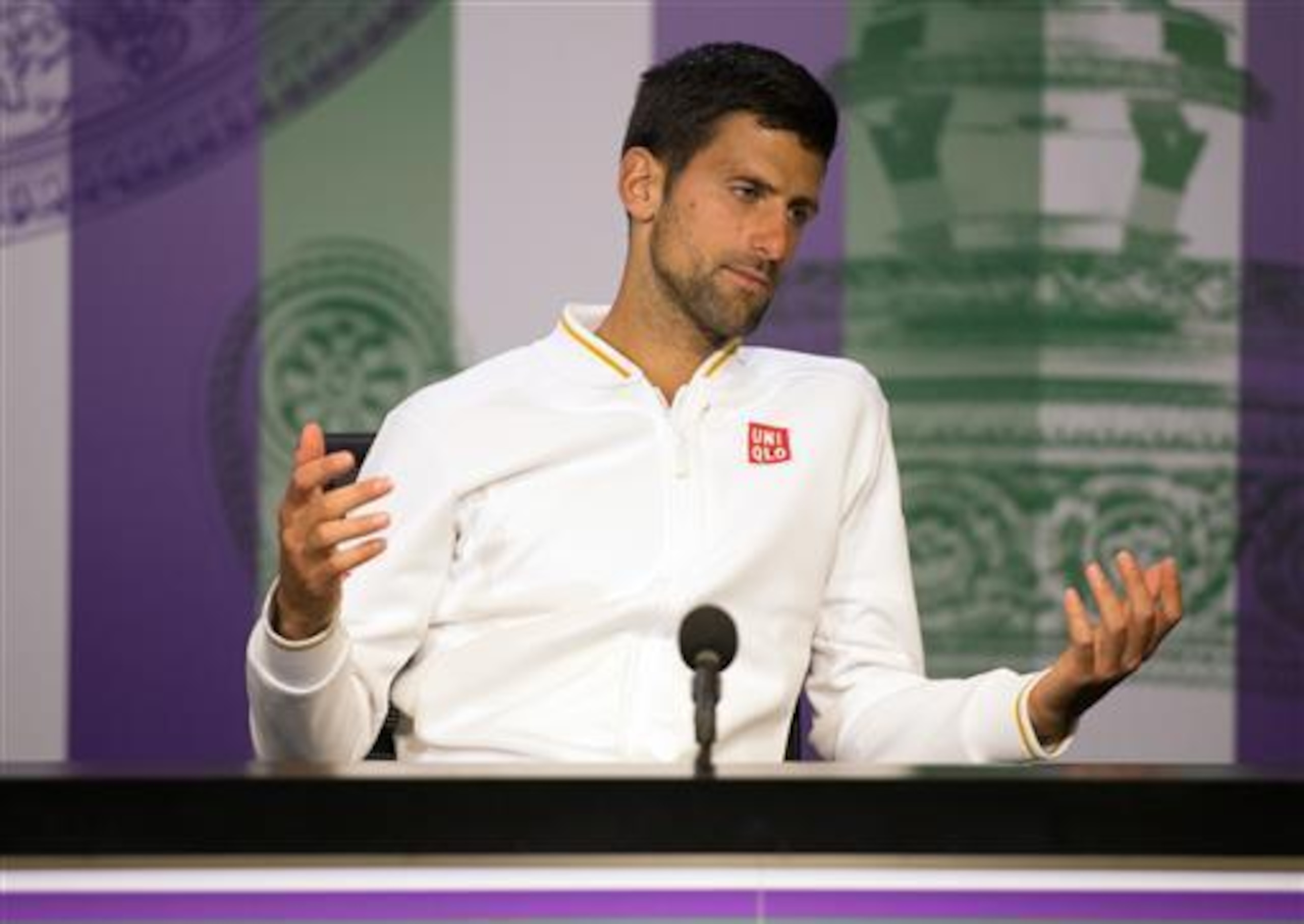 Novak Djokovic speaks to reporters during post-match press conference at Wimbledon 2016. Novak Djokovic speaks to reporters during post-match press conference at Wimbledon 2016.