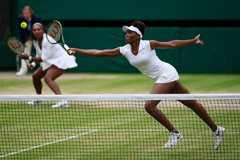 Serena and Venus Williams during the ladies doubles final at Wimbledon 2016.