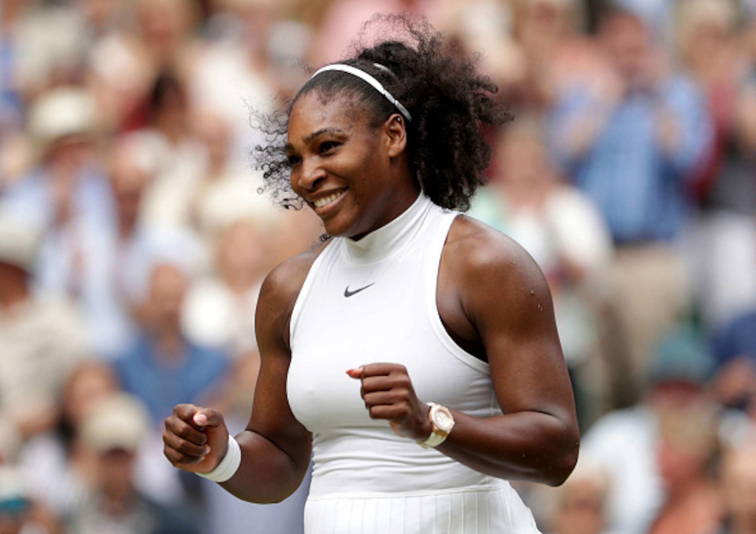 Serena Williams celebrates winning Wimbledon 2016.