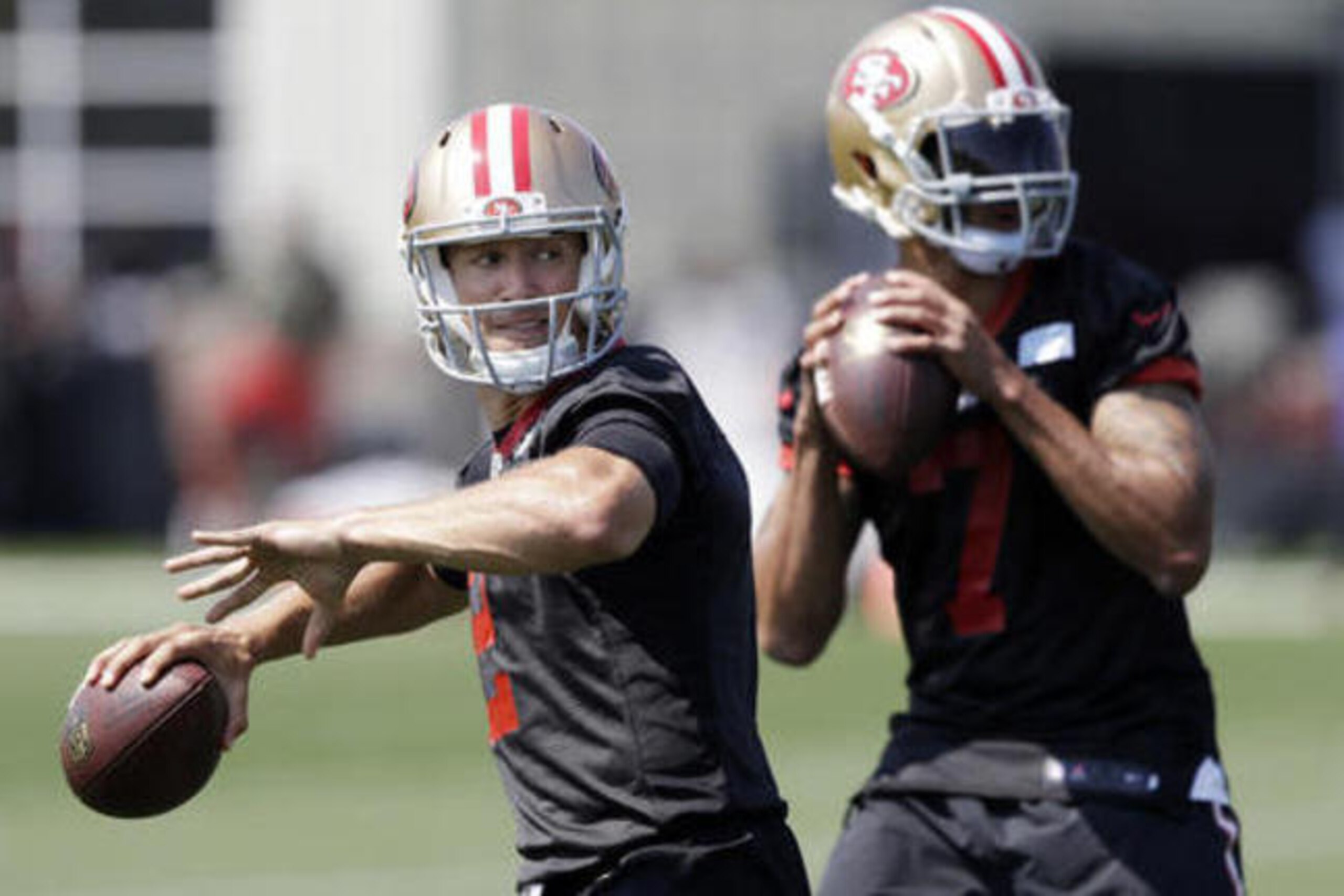 49ers QBs Blaine Gabbert (left) and Colin Kaepernick
