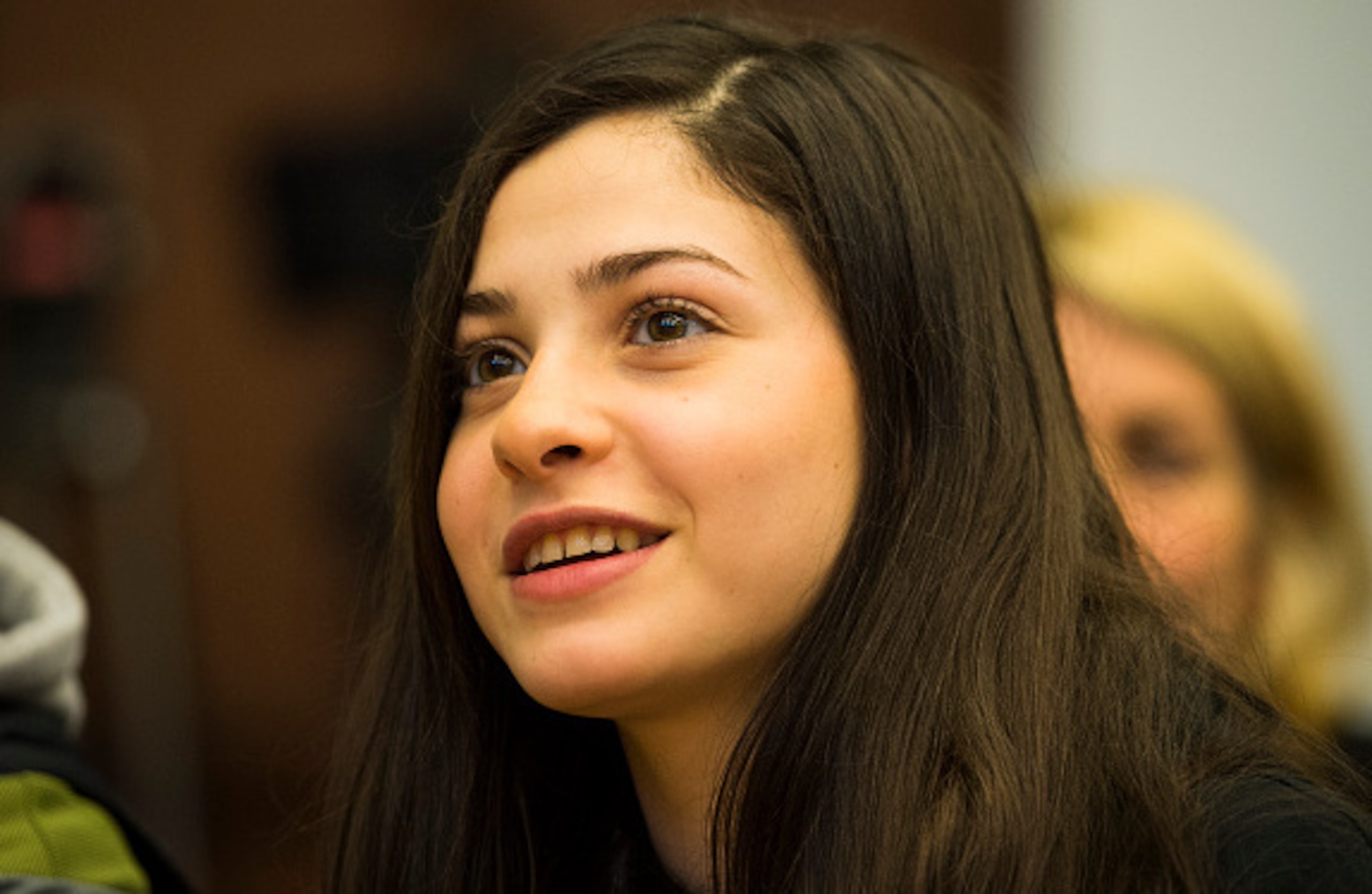 Yusra Mardini fled Syria and reached Europe, spending part of the journey pushing and pulling an overloaded boat through open water.