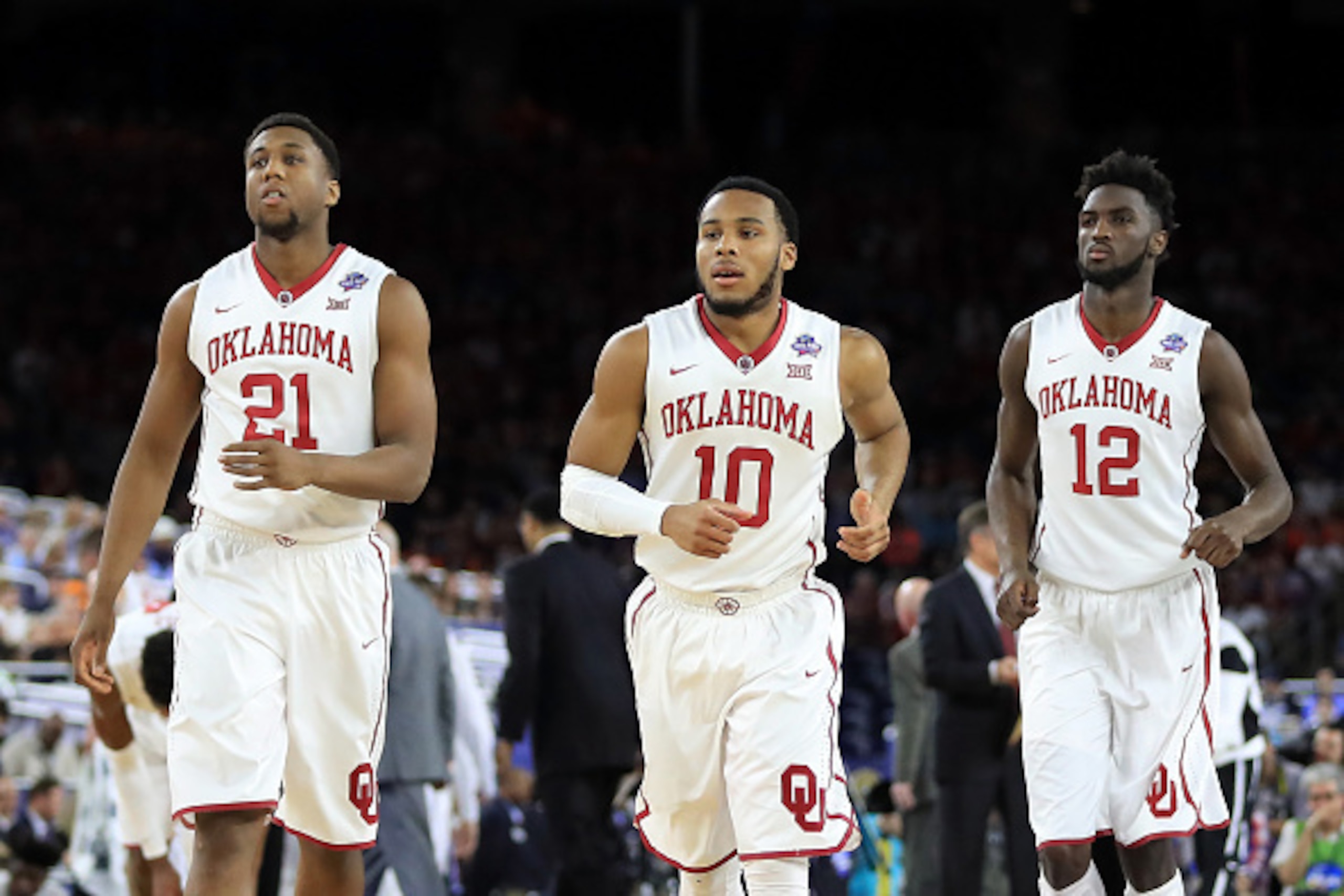 Dante Buford (21), Jordan Woodard (10) and Khadeem Lattin (12)