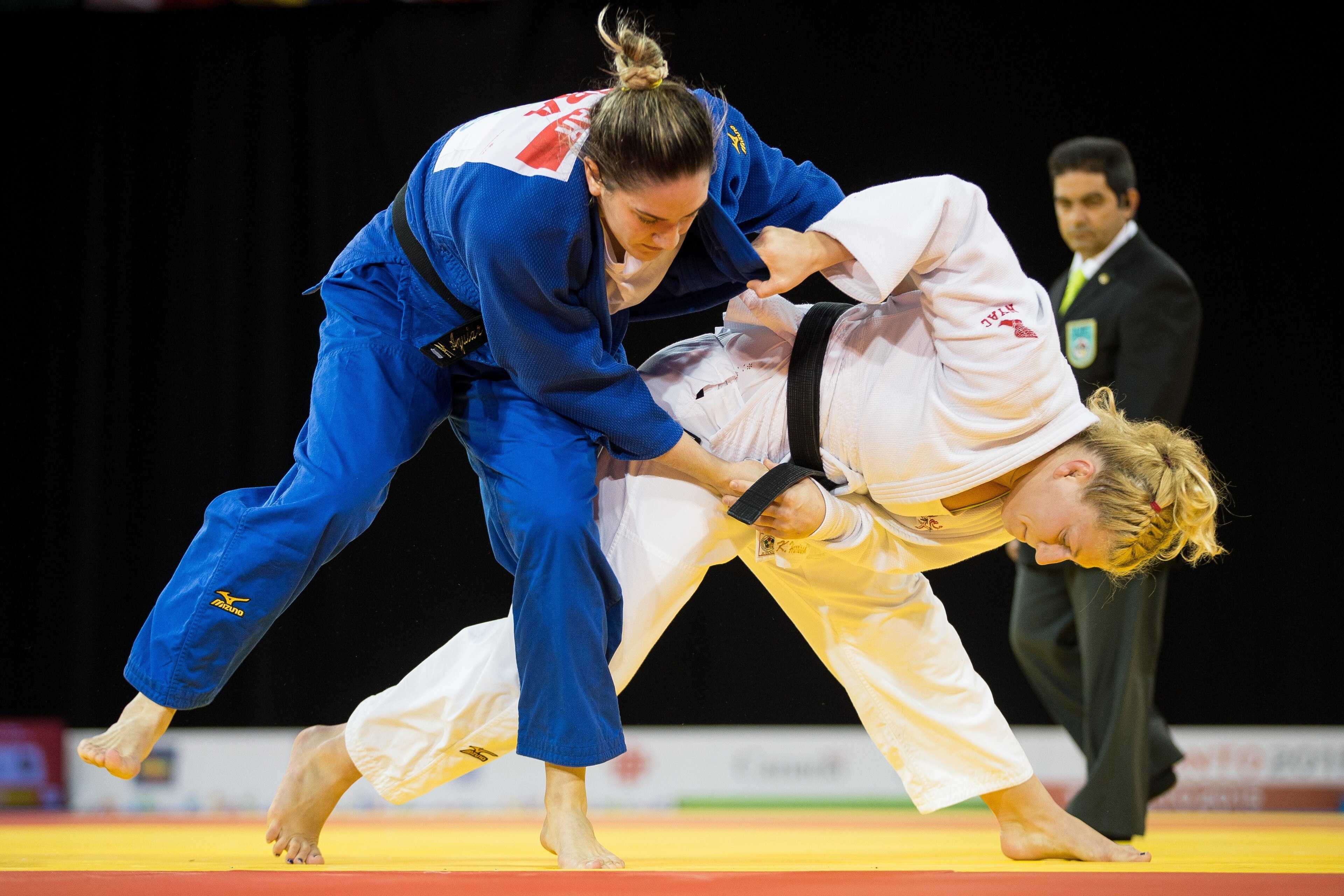 Mayra Aguiar (left) and Kayla Harrison Mayra Aguiar (left) and Kayla Harrison