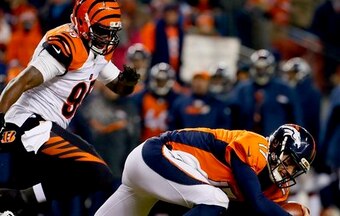 DE Wallace Gilberry (left) comes to Detroit after four seasons with the Bengals.