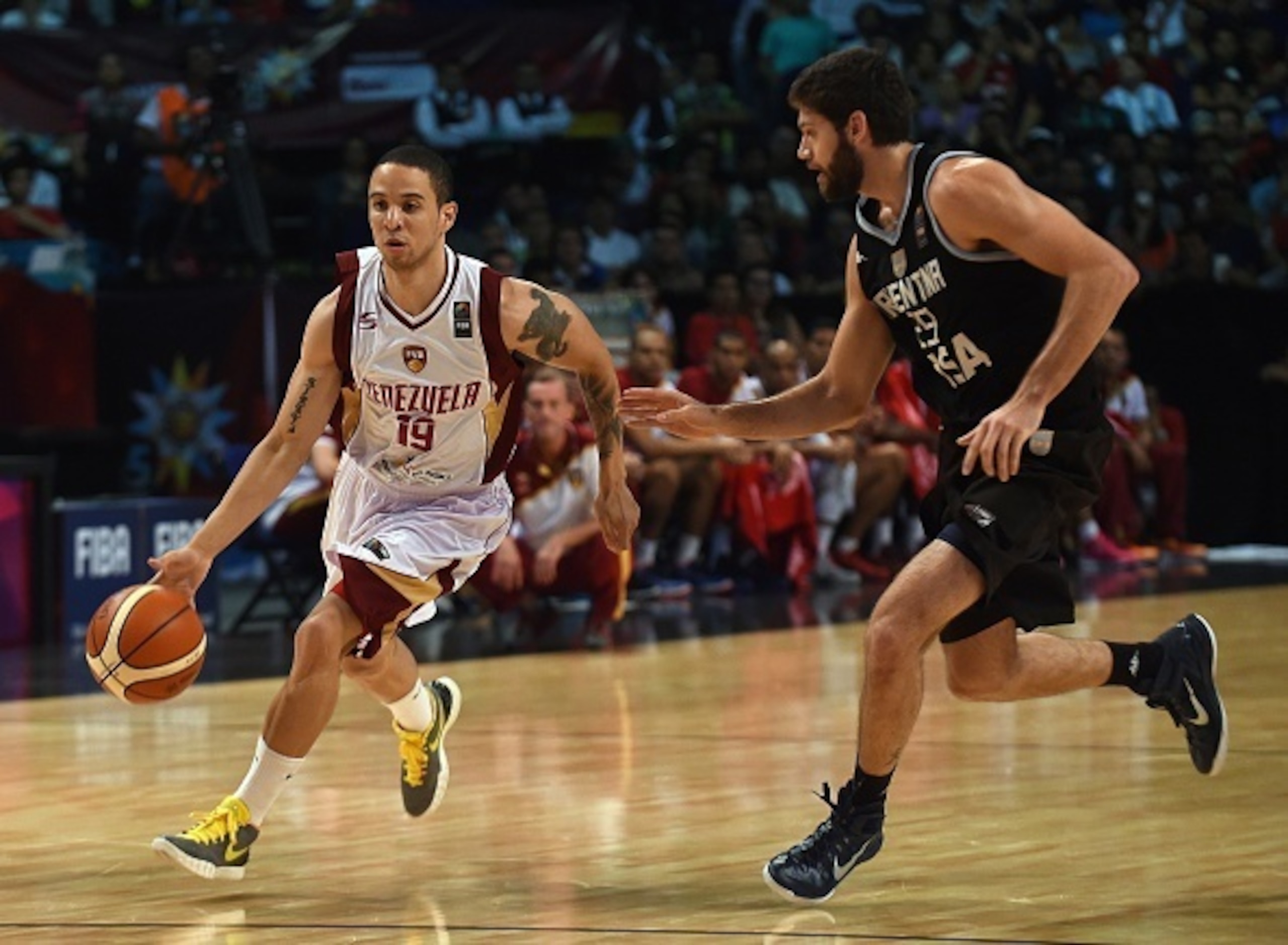 Heissler Guillent dribbles for Venezuela against Argentina.
