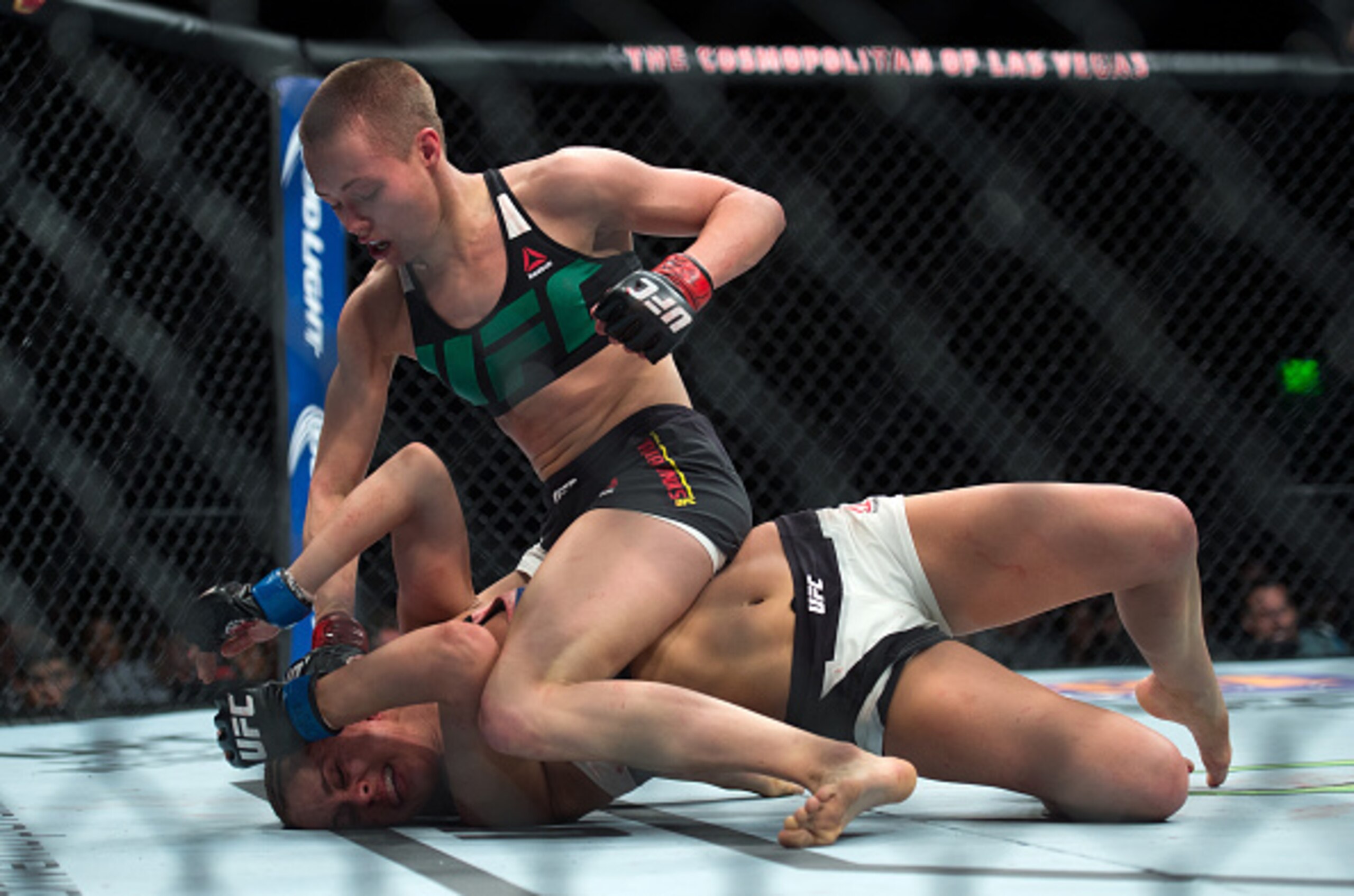 Rose Namajunas punches Paige VanZant.