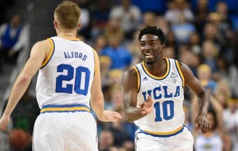 Bryce Alford (20) and Isaac Hamilton (10)