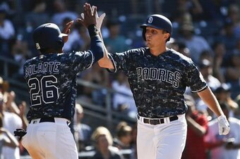 Alex Dickerson homered in four straight games before injuring his hip in an outfield collision.