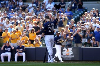 Jonathan Lucroy waved goodbye to the Milwaukee Brewers and said hello to a potential World Series contender in the Texas Rangers.
