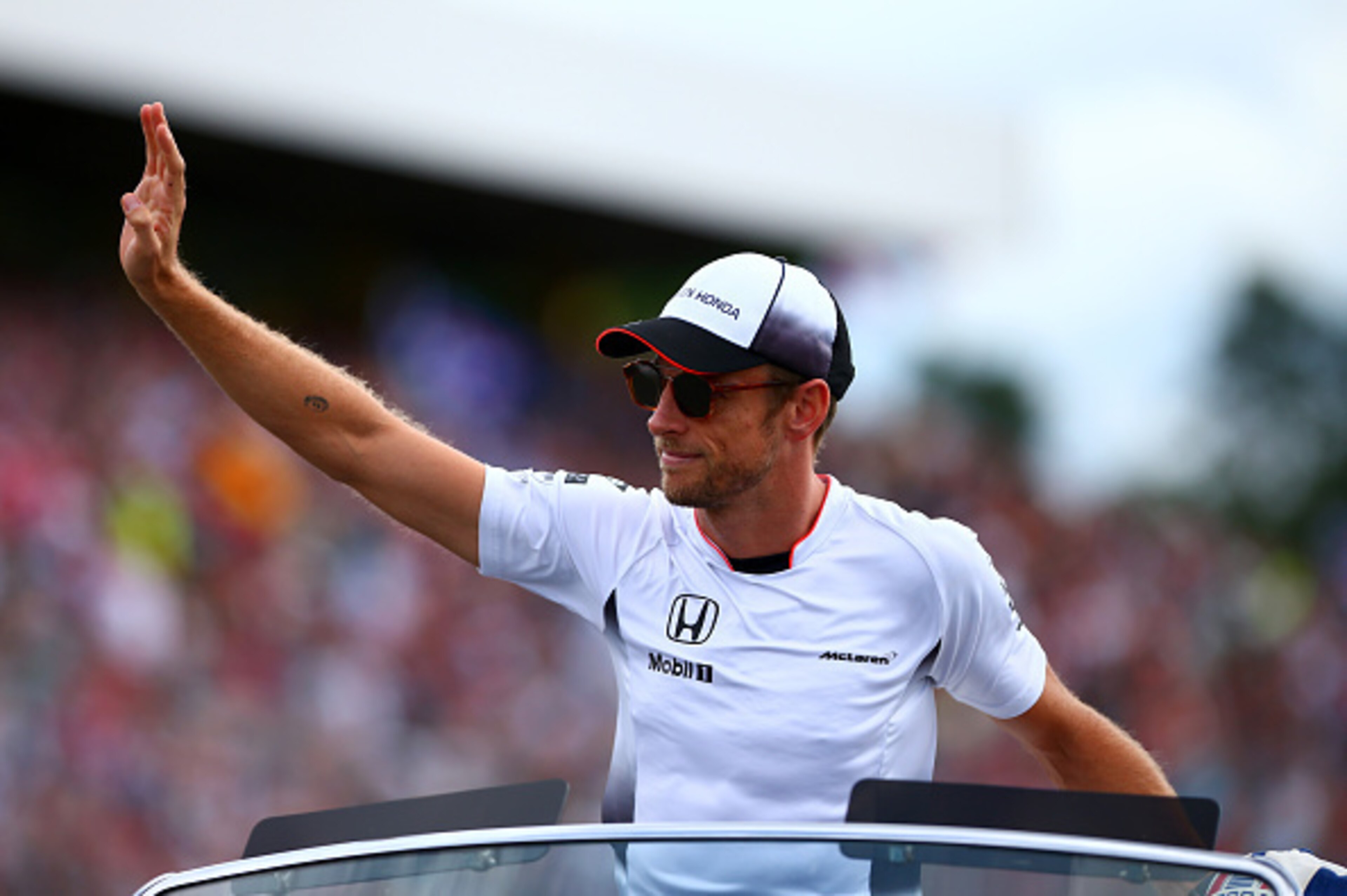 HOCKENHEIM, GERMANY - JULY 31:  Jenson Button of Great Britain and McLaren Honda takes part in the drivers' parade during the Formula One Grand Prix of Germany at Hockenheimring on July 31, 2016 in Hockenheim, Germany.  (Photo by Dan Istitene/Getty Images