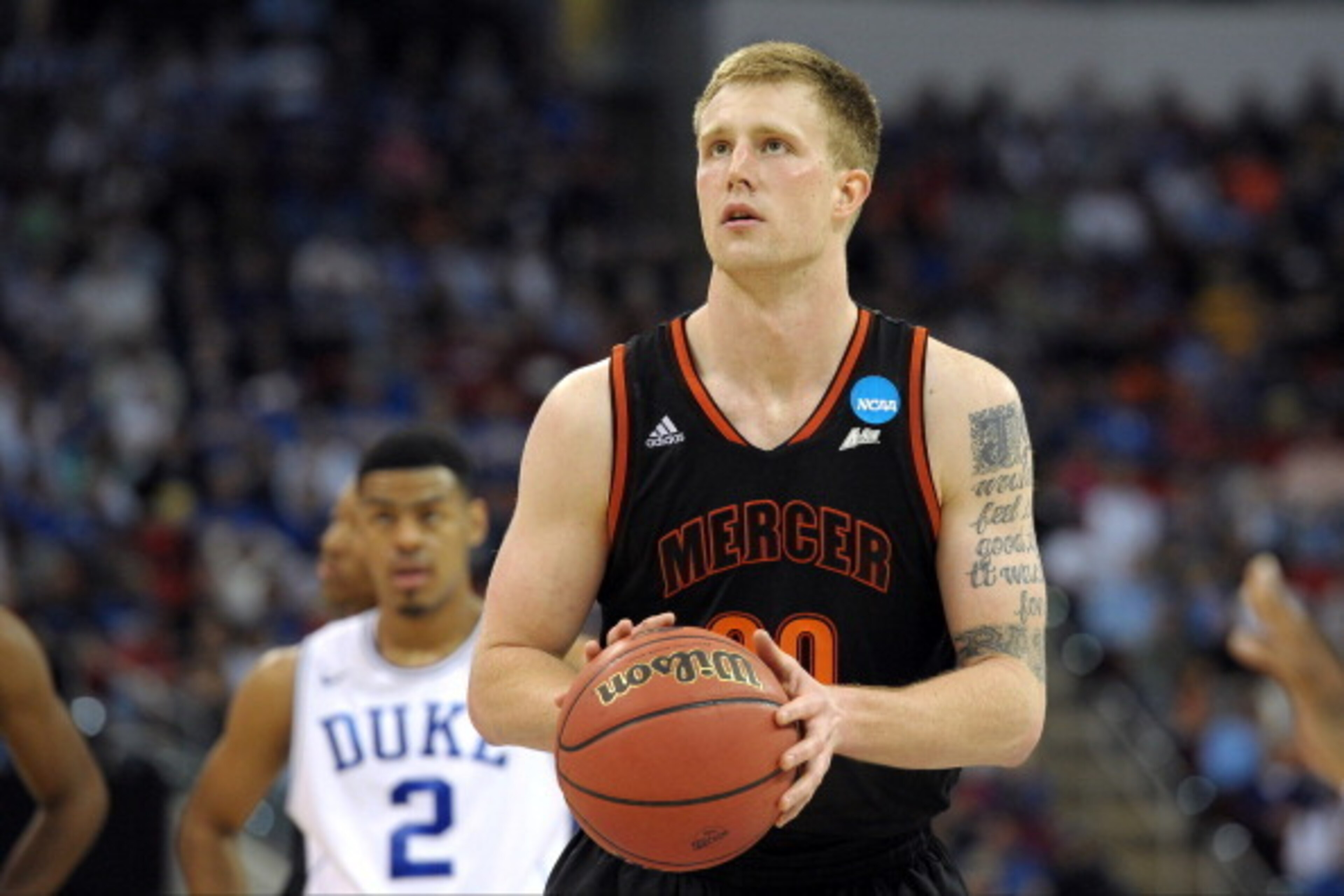 Quinn Cook watches as Mercer upsets Duke in 2014.