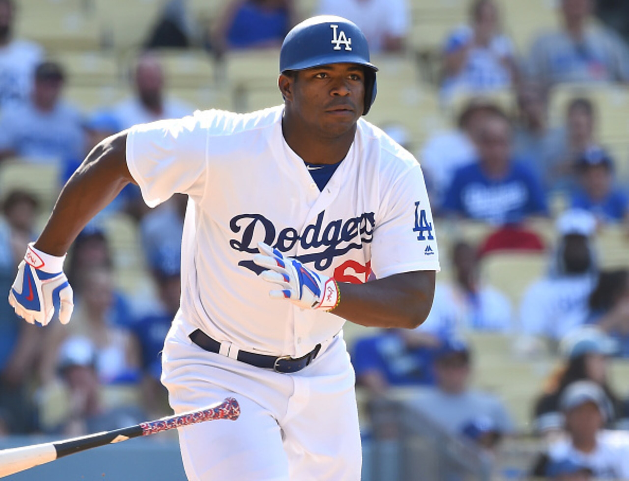 The Los Angeles Dodgers demoted Yasiel Puig after acquiring outfielder Josh Reddick from Oakland.