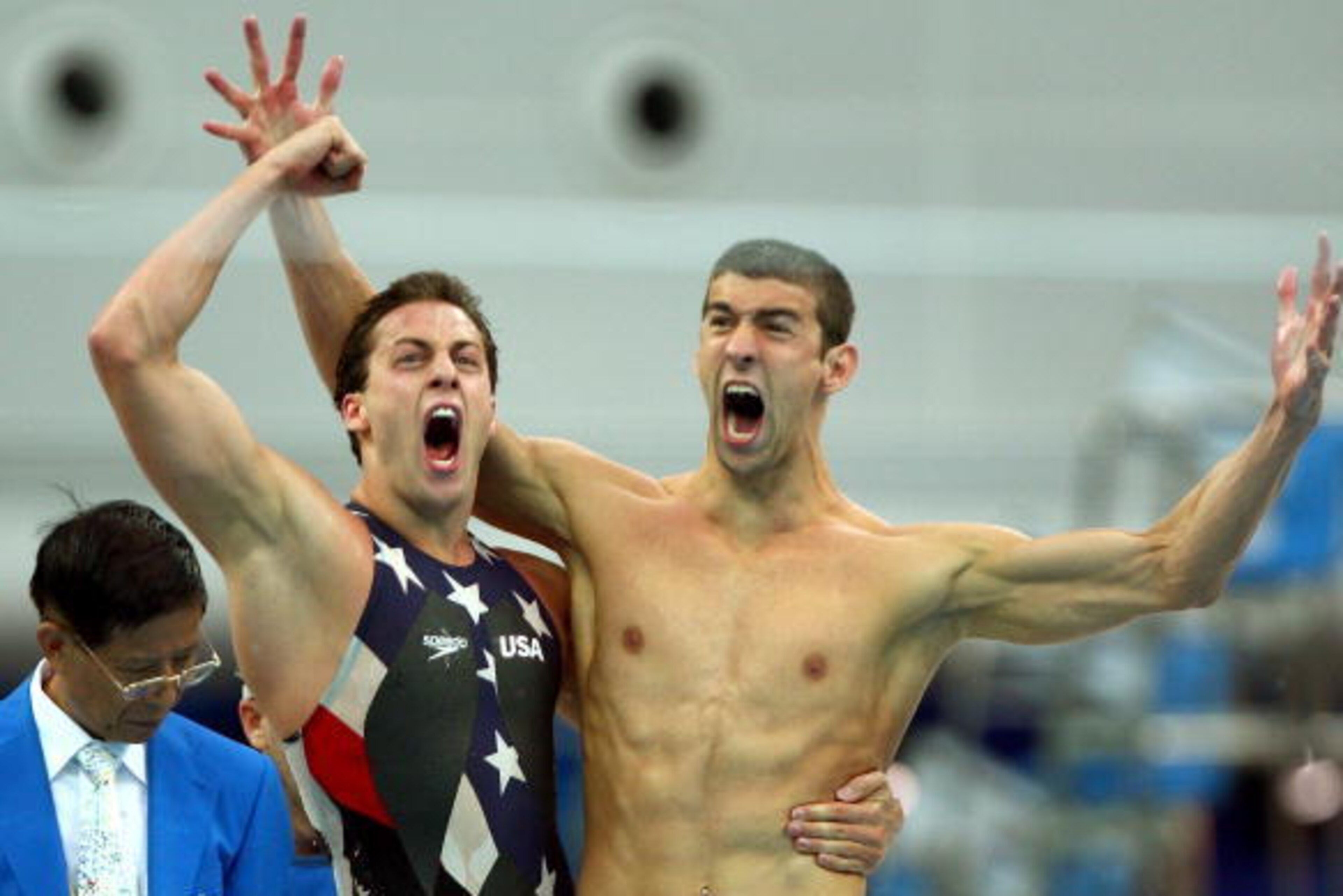 Garrett Weber-Gale and Michael Phelps exult in Beijing.