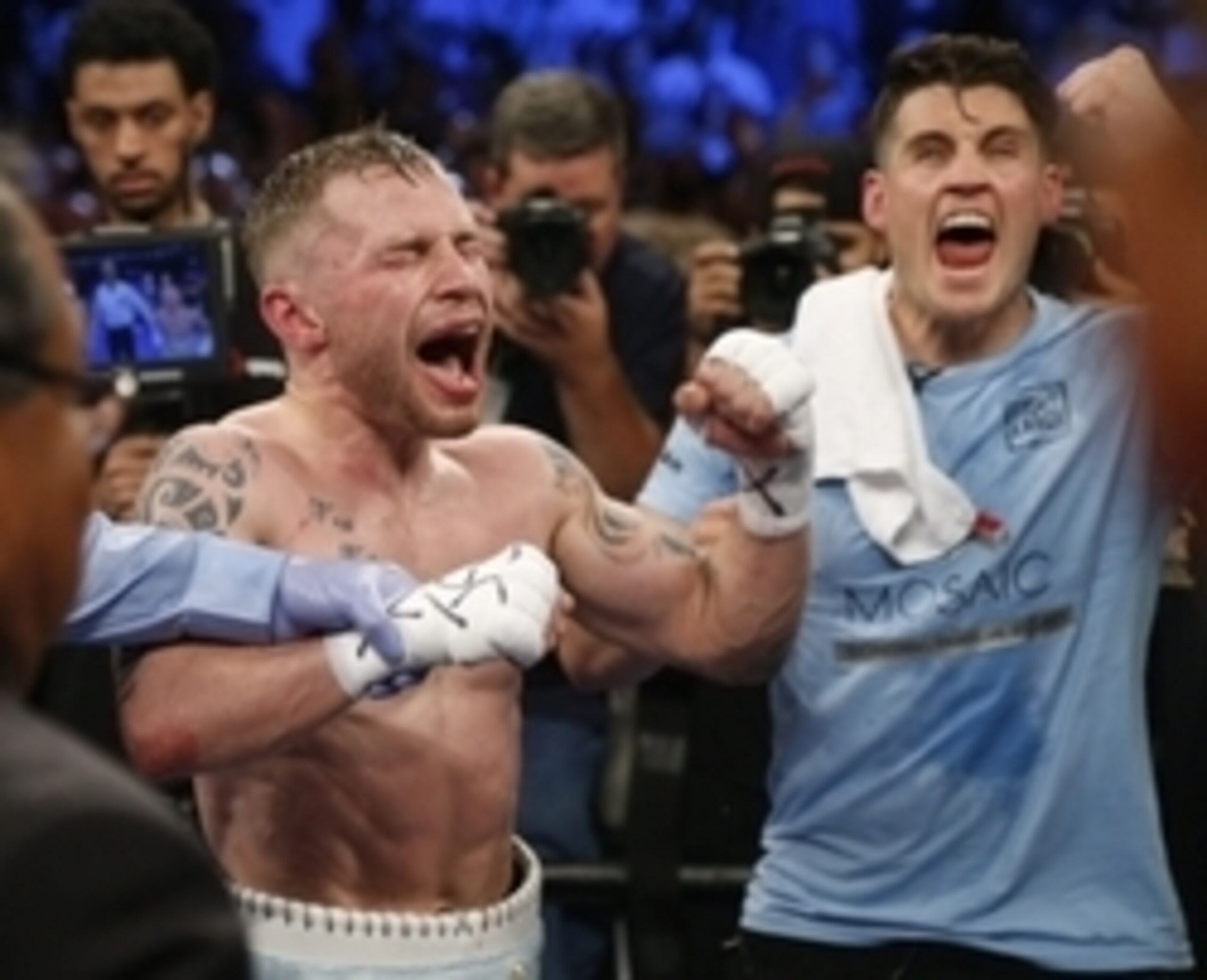 Carl Frampton (left) and trainer Shane McGuigan react to the result in Brooklyn.