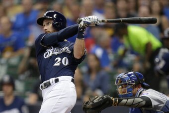 Catcher Jonathan Lucroy was traded from the Milwaukee Brewers to the Texas Rangers.