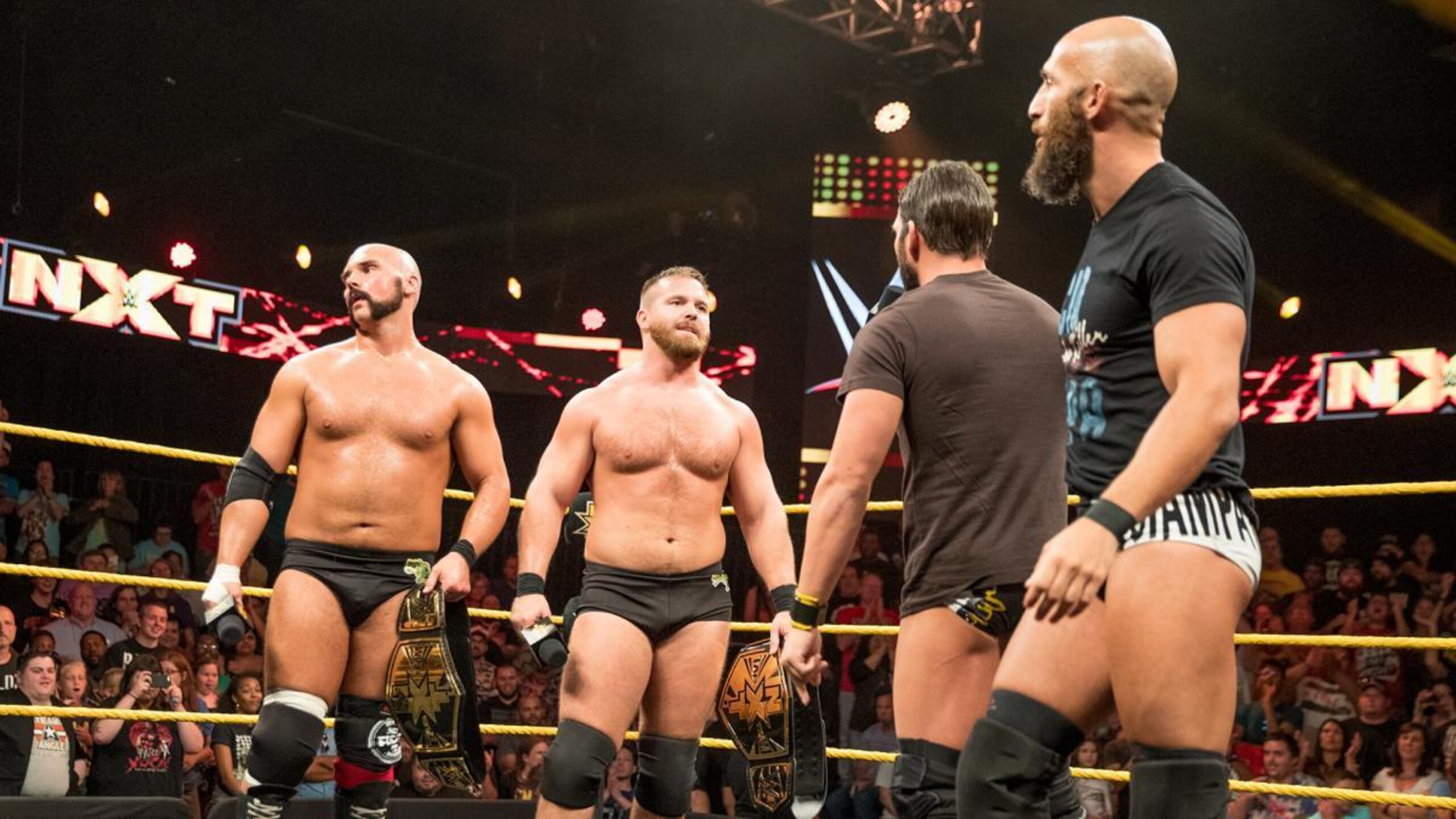 The Revival faces off with Tommaso Ciampa and Johnny Gargano after beating TM-61. The Revival faces off with Tommaso Ciampa and Johnny Gargano after beating TM-61.