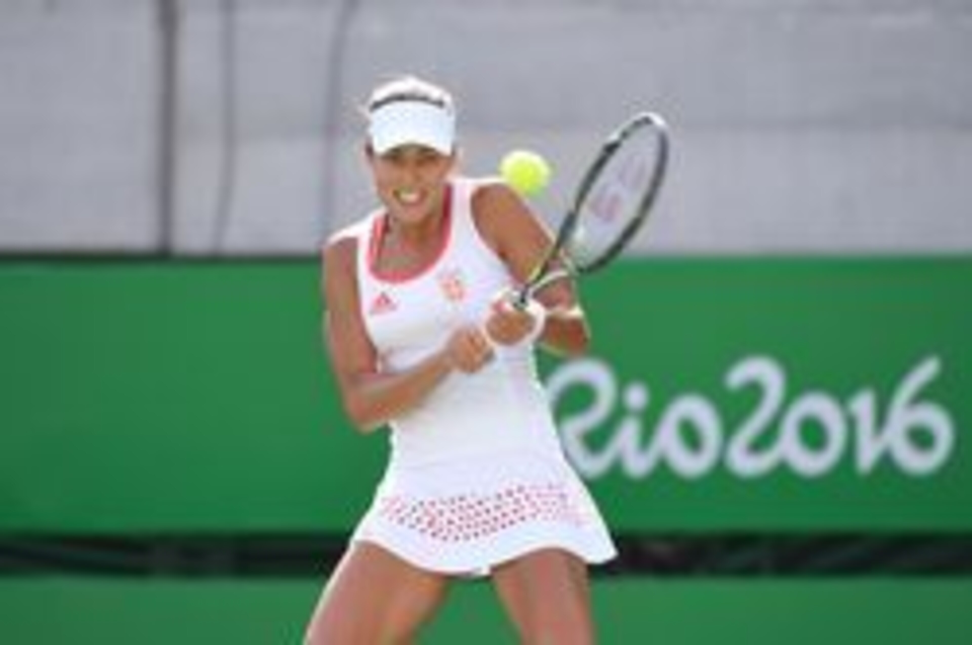 Ana Ivanovic hits a backhand during her first-round loss at the 2016 Olympics in Rio.