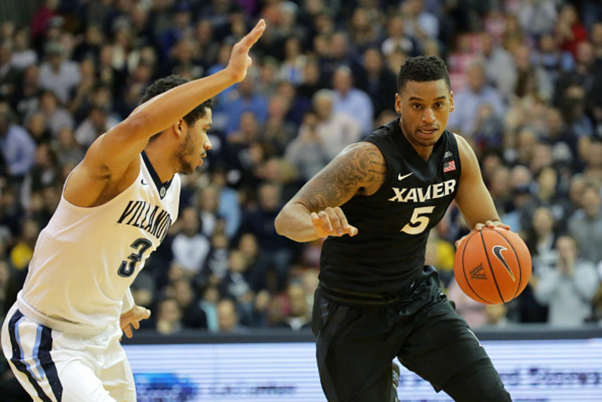 Villanova's Josh Hart (left) and Xavier's Trevon Bluiett are Big East Player of the Year candidates for the conference's two best teams.