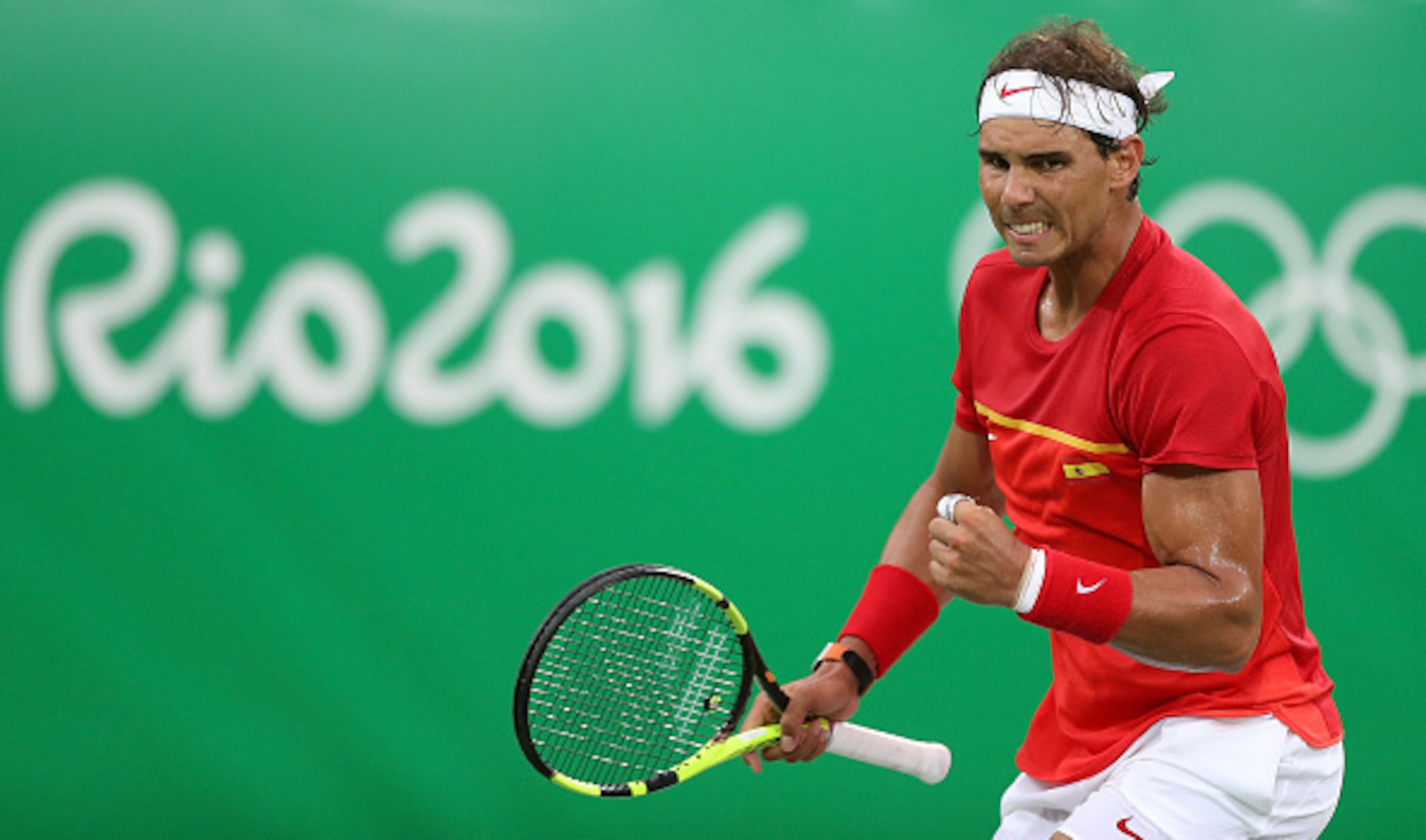 Rafael Nadal fist pumps after a winner during a match at the 2016 Summer Games.
