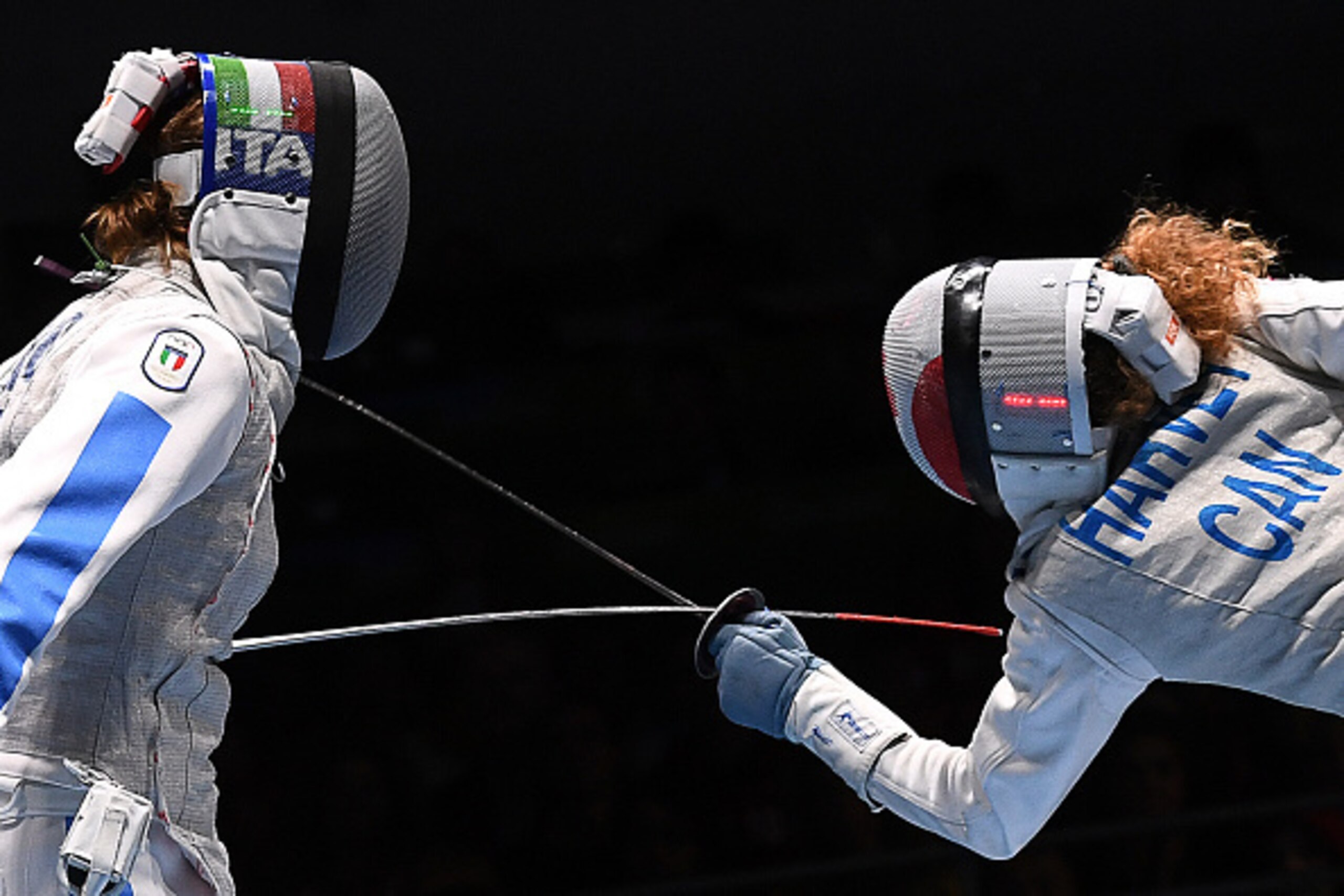 Italy's Arianna Errigo falls to Canada's Eleanor Harvey.