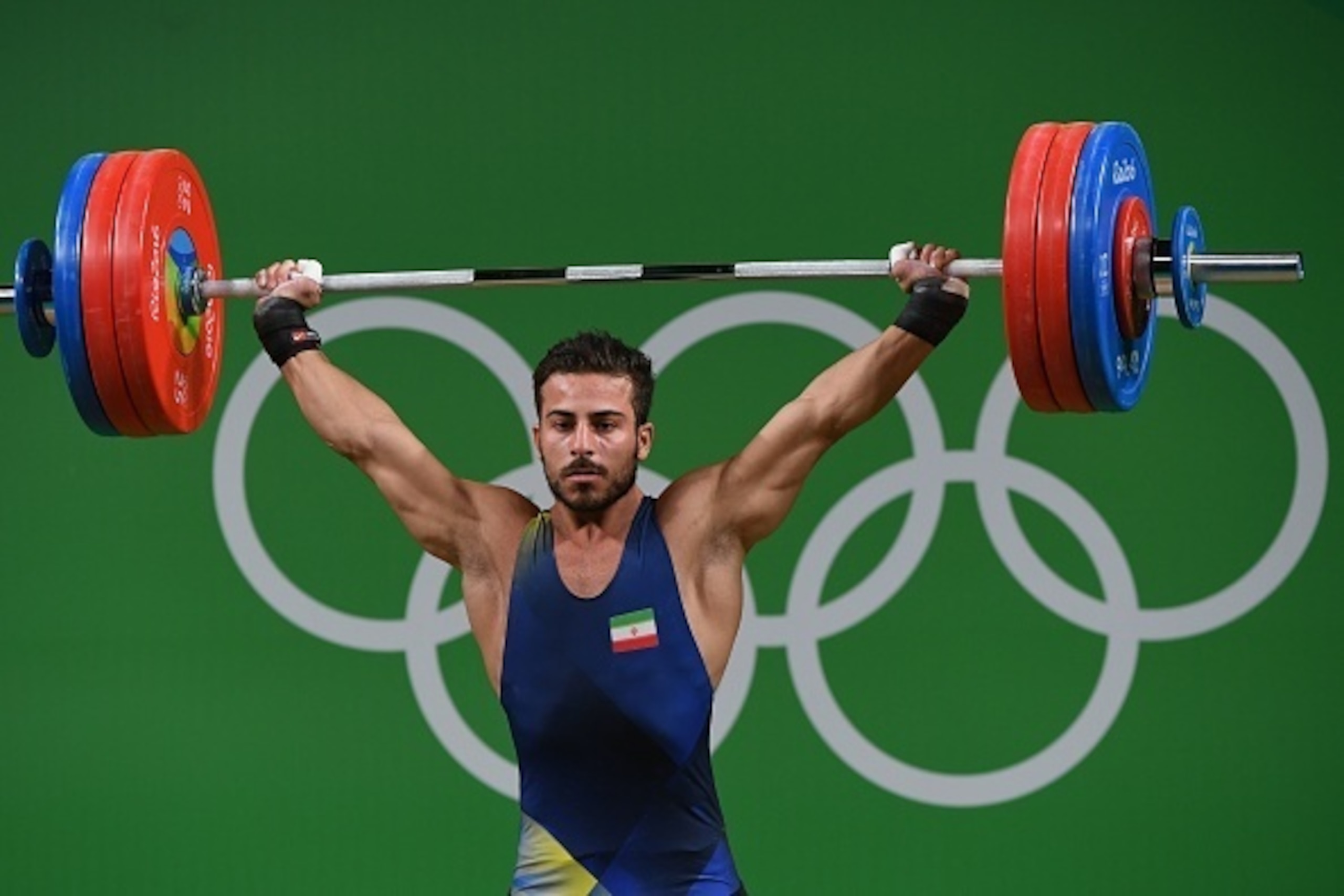 Iran's Kianoush Rostami won gold by setting a new world record.