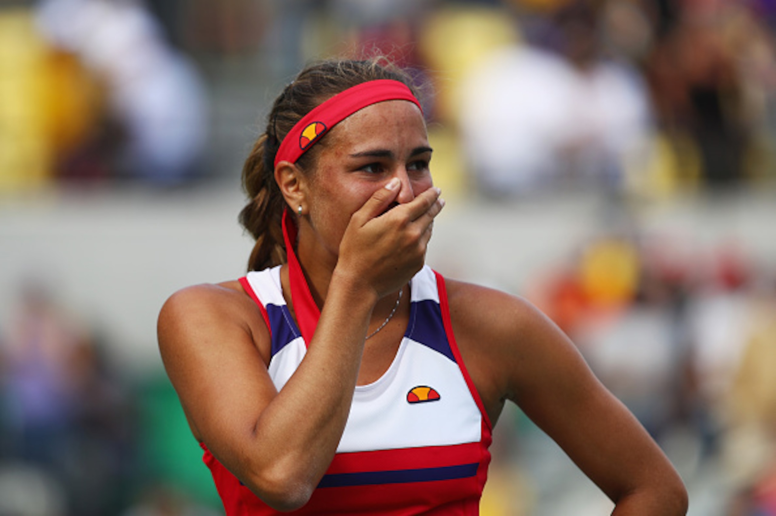 RIO DE JANEIRO, BRAZIL - AUGUST 12:  Monica Puig of Puerto Rico reacts after defeating Petra Kvitova of the Czech Republic during the Women's Singles Semifinal on Day 7 of the Rio 2016 Olympic Games at the Olympic Tennis Centre on August 12, 2016 in Rio d
