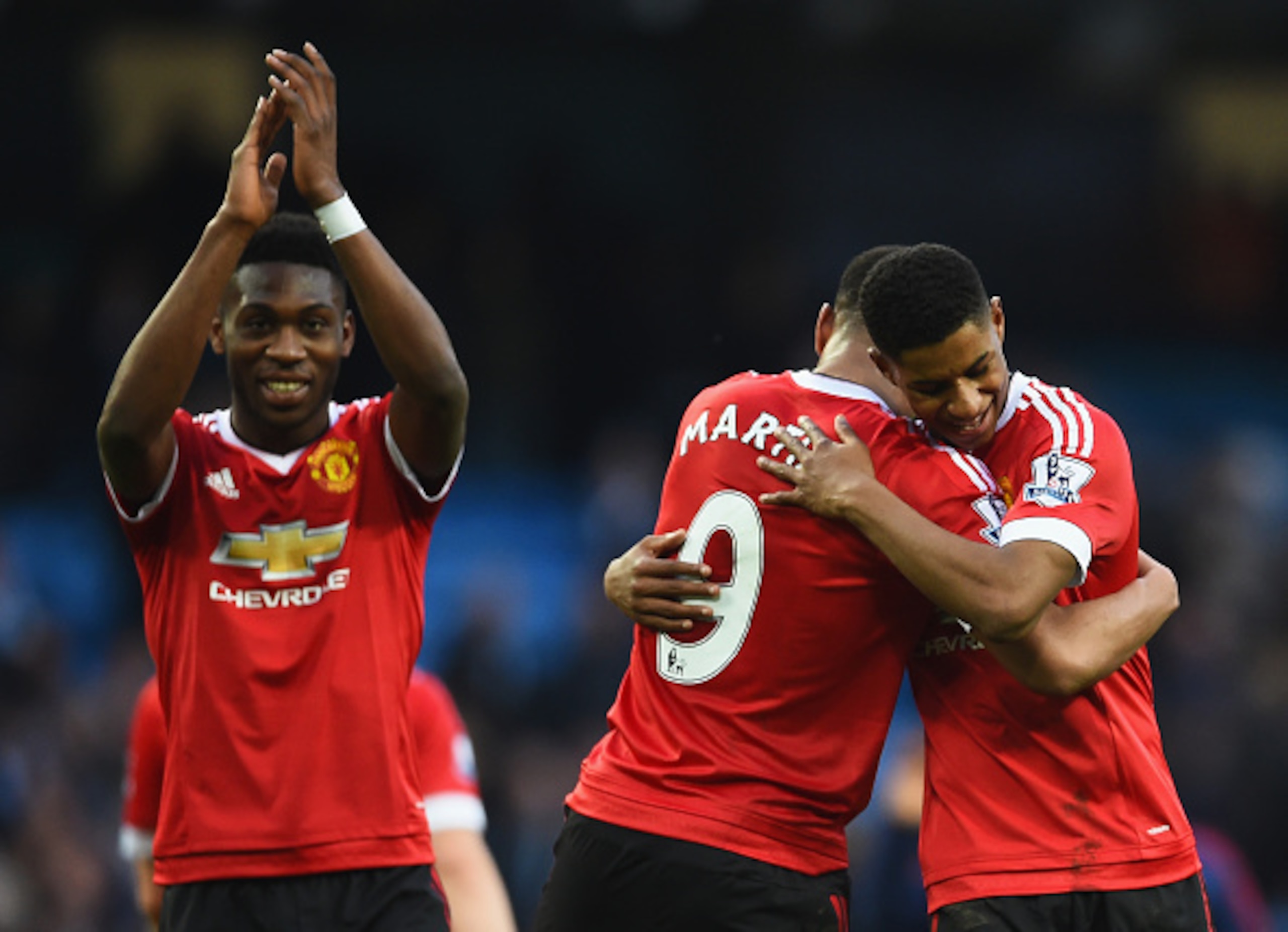 Fosu-Mensah, Martial and Rashford celebrate.